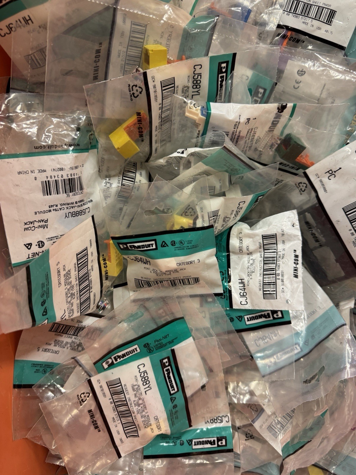 Lot Of 300+pcs Panduit Mini Com RJ, Mini Jack, CAT5 CAT6, CAT3 & More NEW  Ma6t