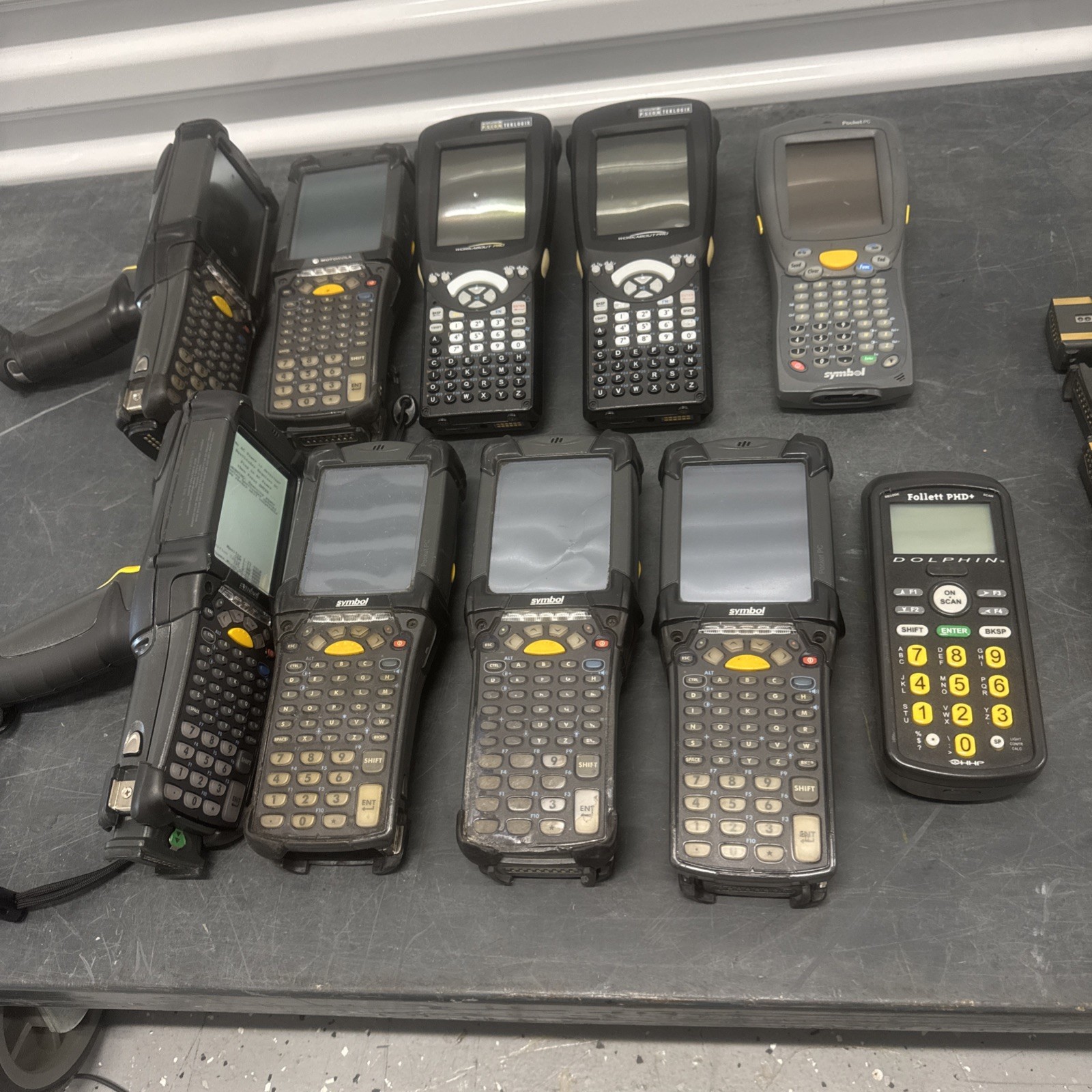 Lot of 10  Motorola/ Symbol / Dolphin Mobile Computer Barcode Scanner and  24 Ba