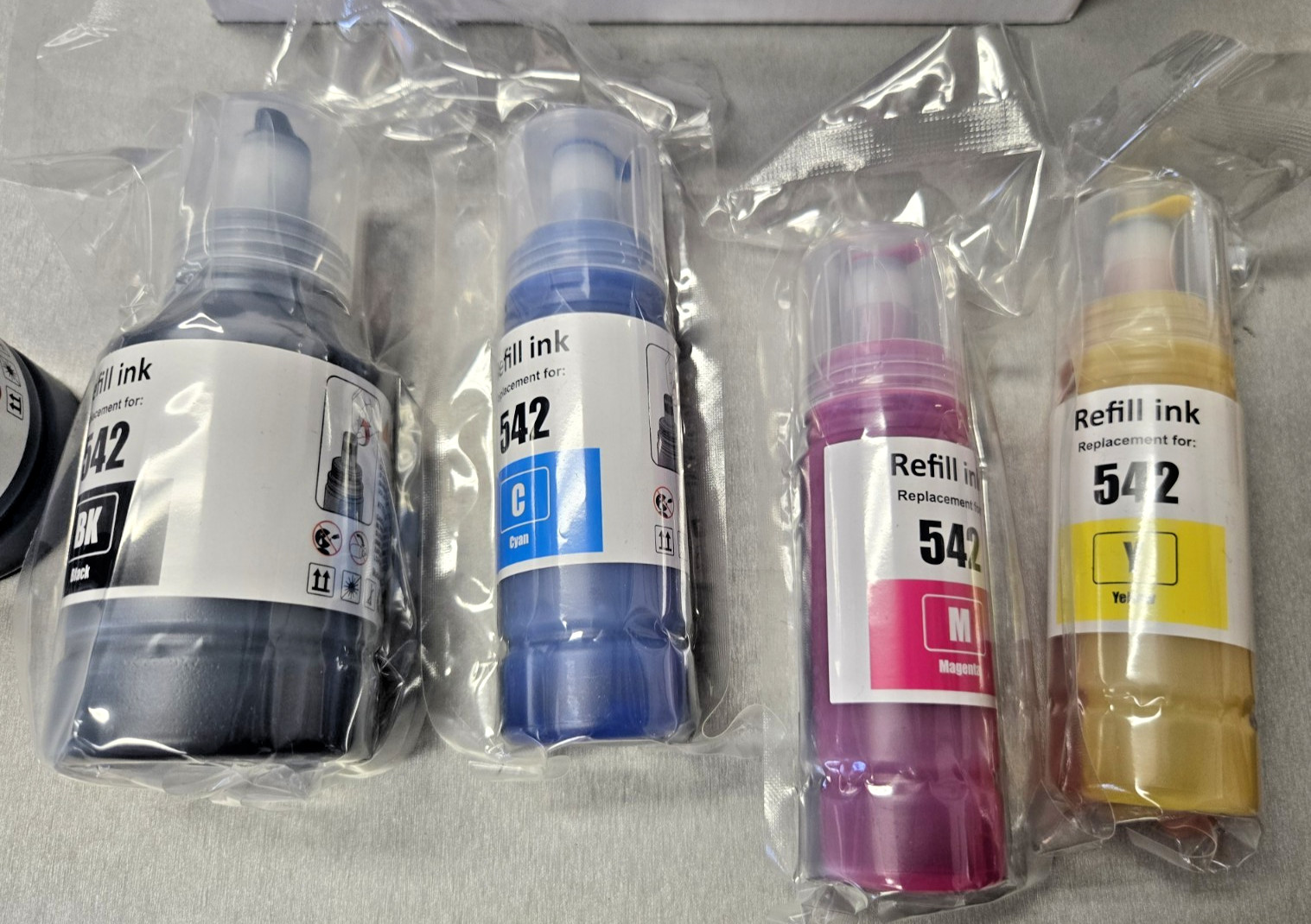 T542 Ink Refill Bottles 4 pk Set one black is half it will come for free  #0958