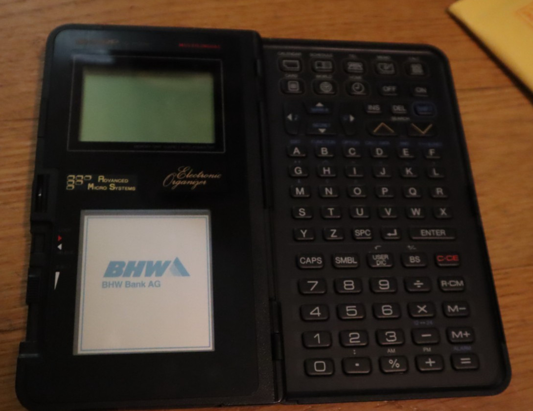 Sharp Electronic Organizer Sharp IQ-7100M wizard advanced micro systems flexard