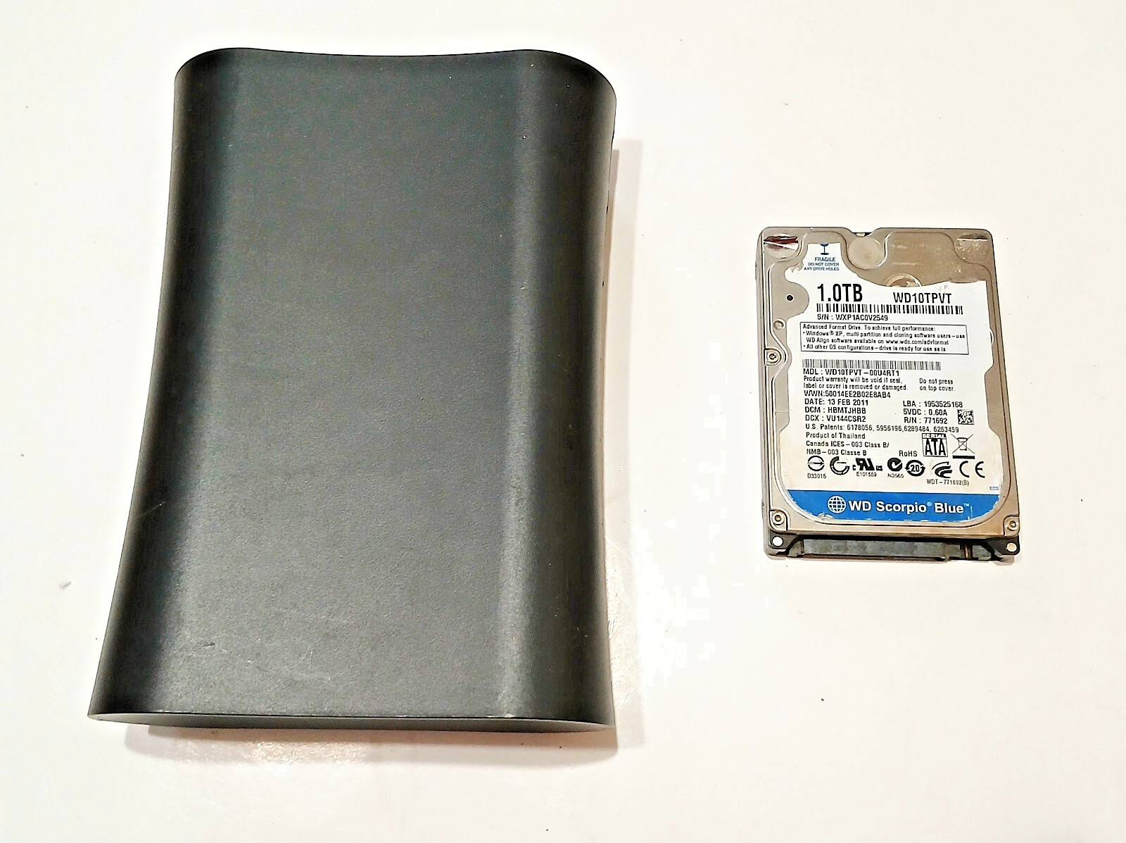 2 USED, HITACHI & WESTERN DIGITAL. 1TB INTERNAL & EXTERNAL HARD DRIVES. 2 DRIVES