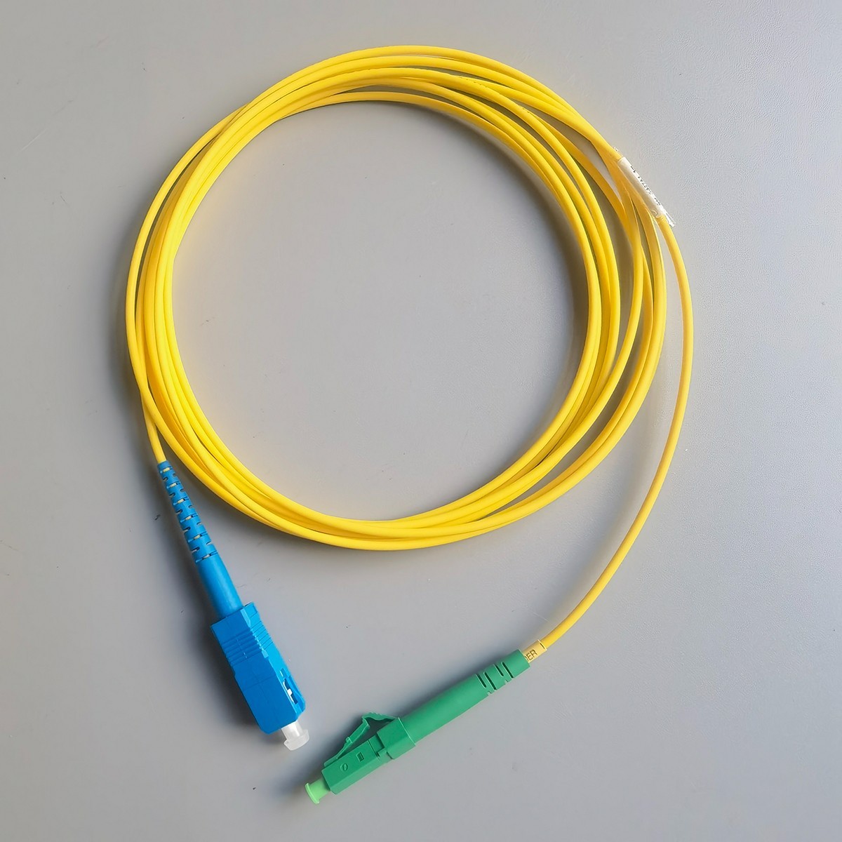 Fiber Patch Cord LC/APC-SC/UPC 3M/25M/30M/35M 2.0mm FTTH G657A1 Simplex Mode