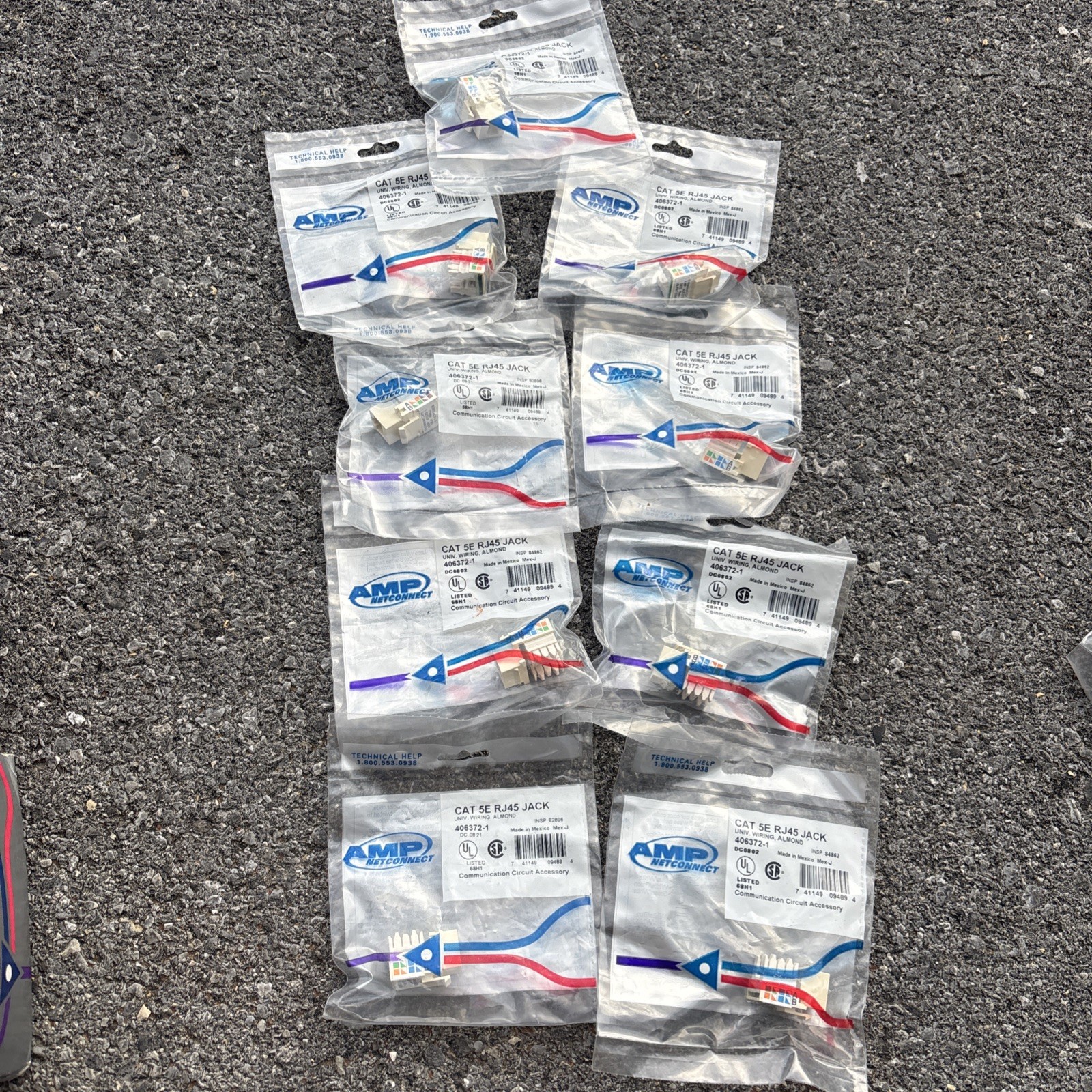 9 Amp netconnect cat 5E RJ 45Jack almond 406372–1