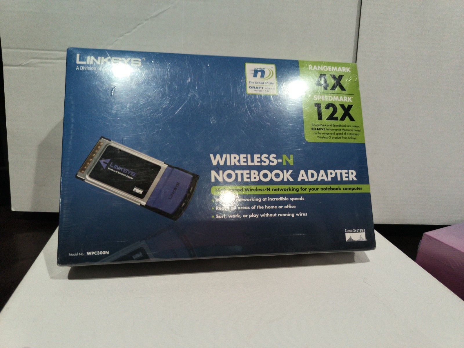 Linksys Wireless-N Notebook Adapter WPC300N Range 4X Speed 12X  New sealed box