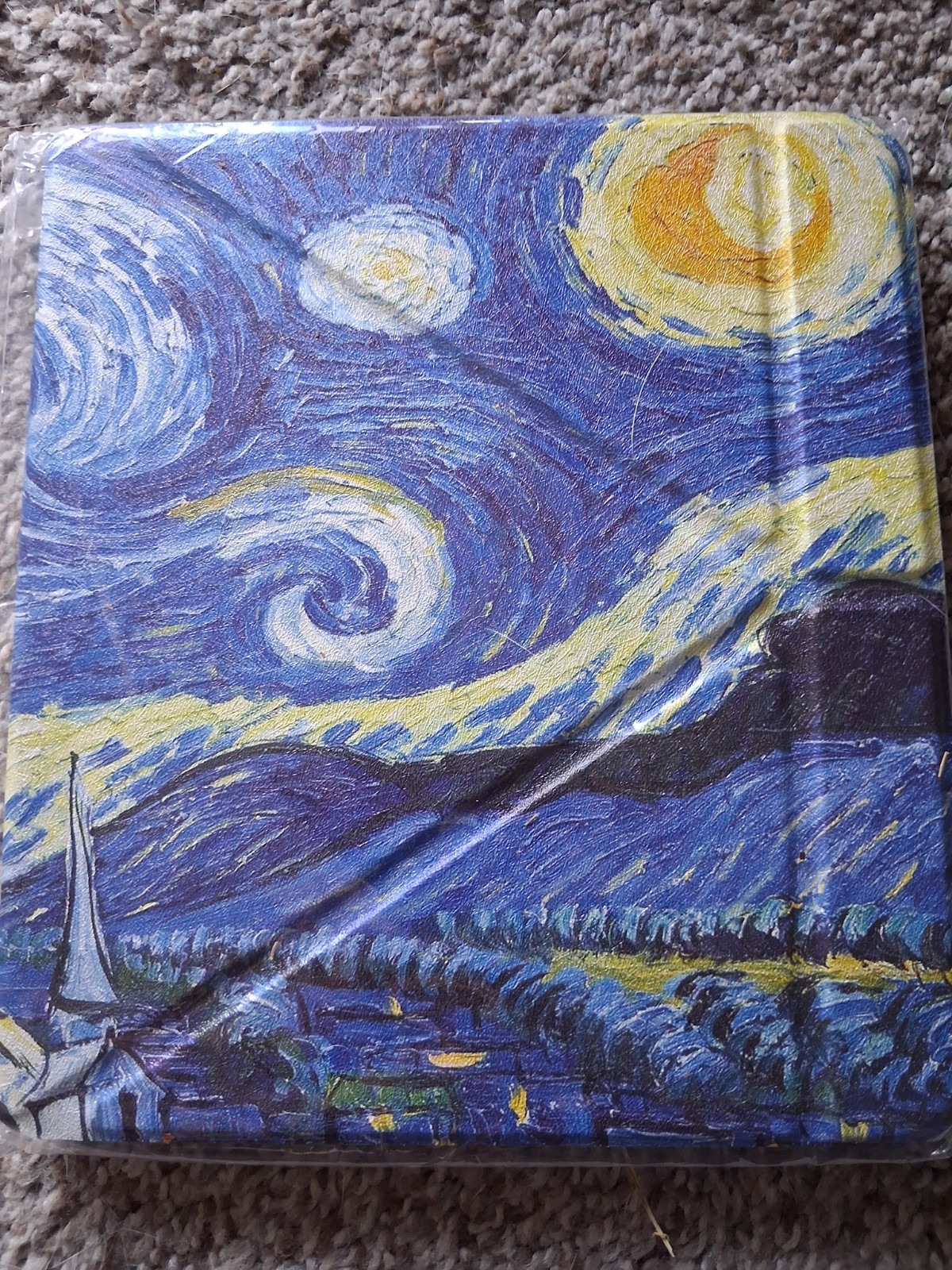 Tablet or e-reader folio case featuring Vincent van Gogh's "The Starry Night"