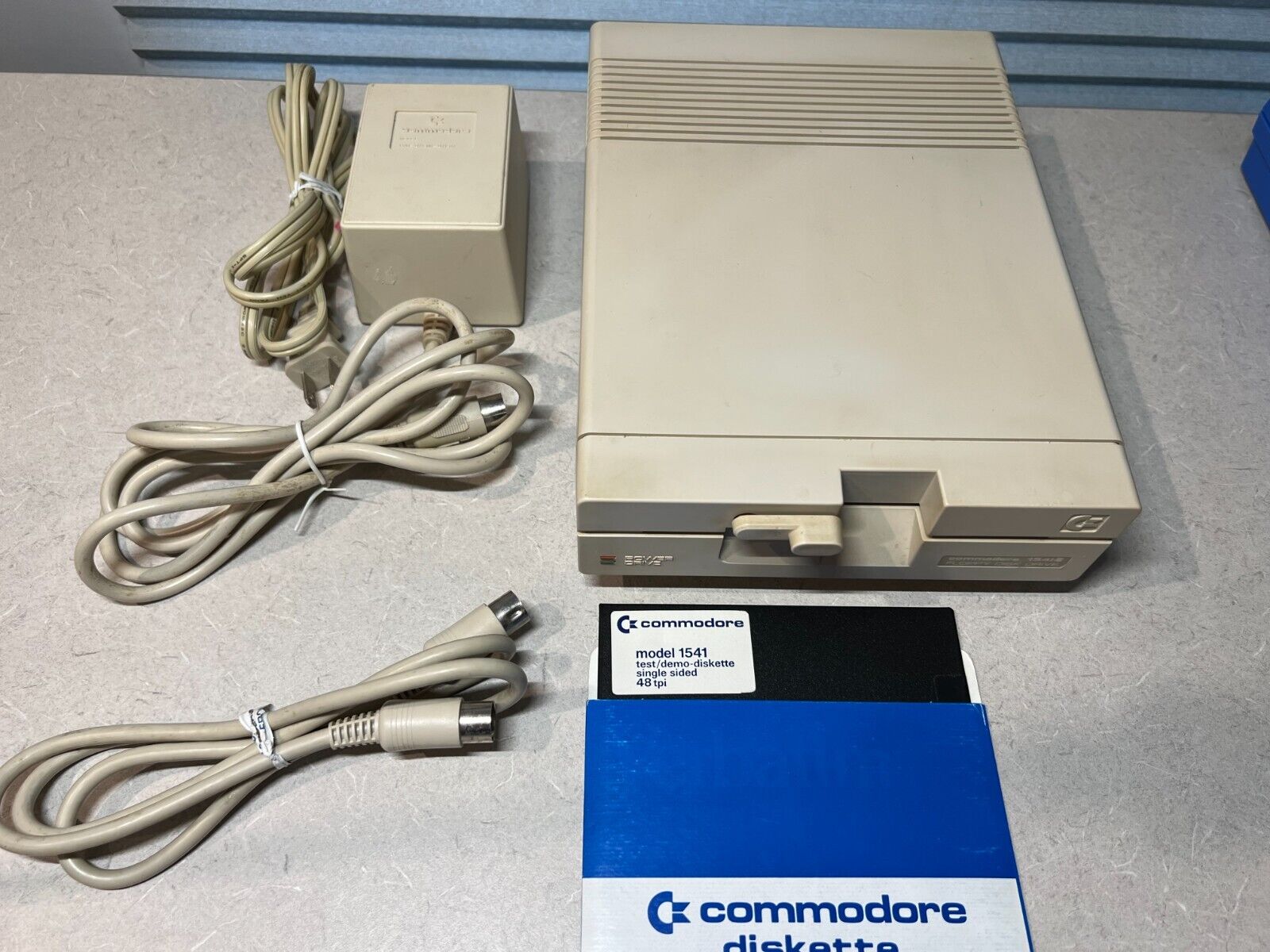 Commodore 1541-ii Disk Drive Tested with Power Supply, Serial Cable & Test Disk
