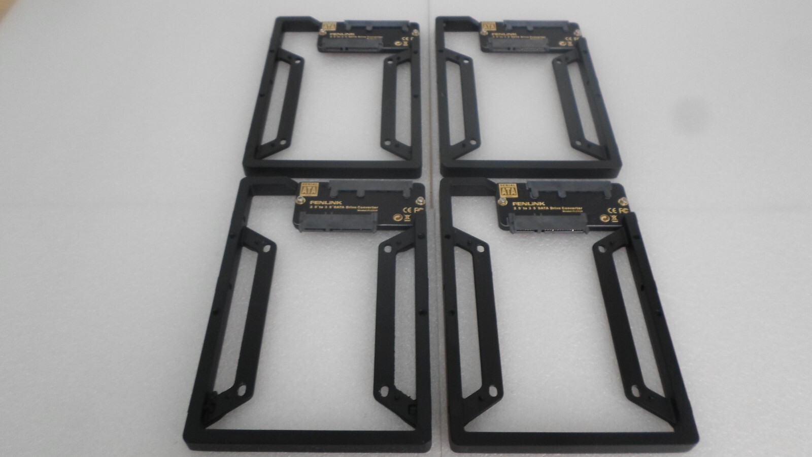 LOT OF 4: FENLINK FL1510 2.5 TO 3.5 SATA DRIVE CONVERTER