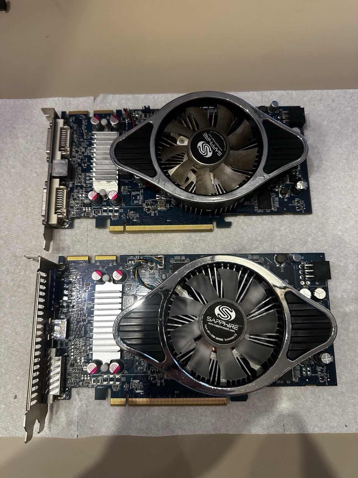 Two (2) Sapphire AMD Radeon HD 4830 512MB PCI-E Crossfire Video Cards & bridges