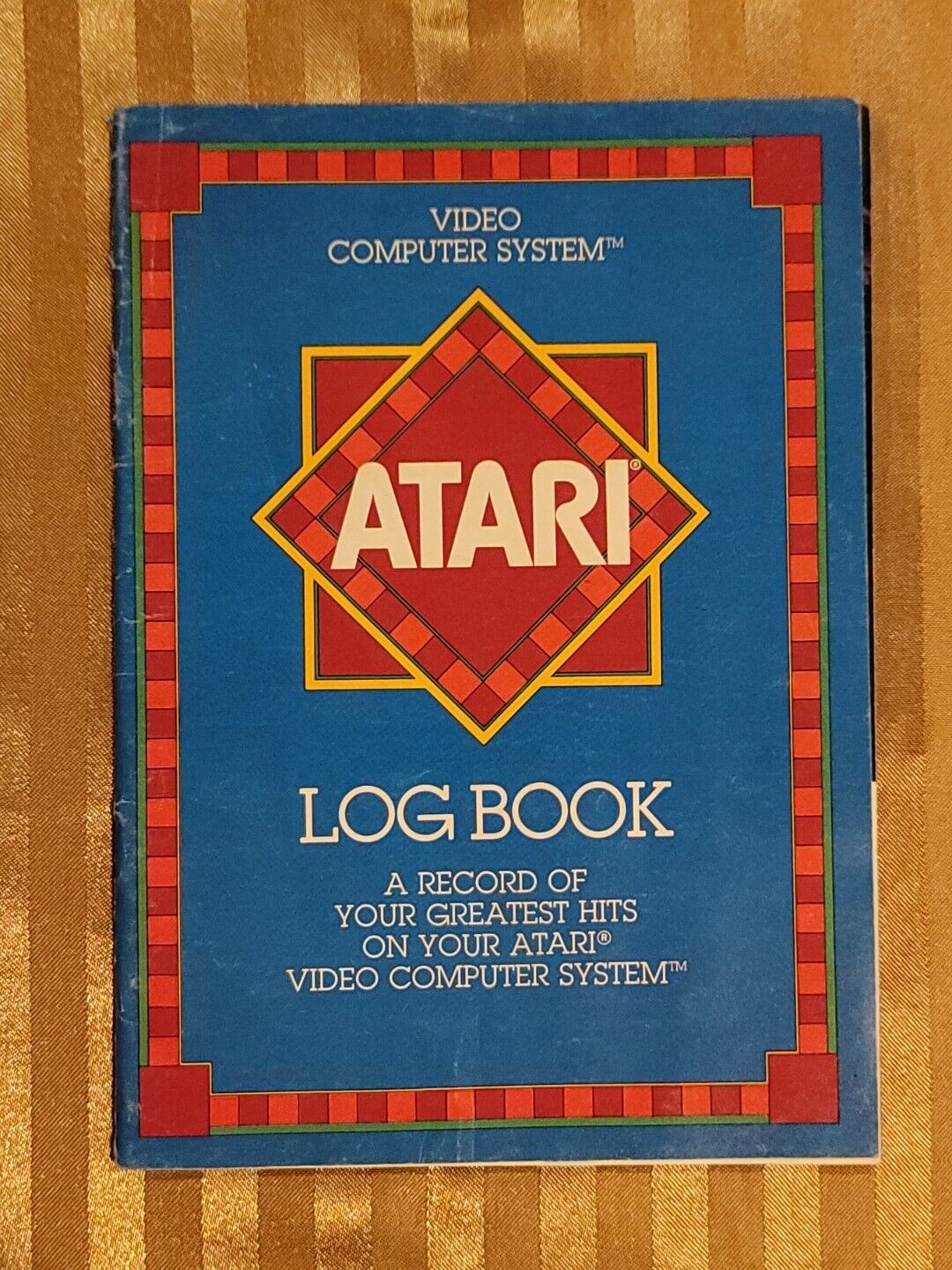 VINTAGE ATARI LOG BOOK A RECOERD OF YOUR GREATEST HITS ON YOUR ATARI