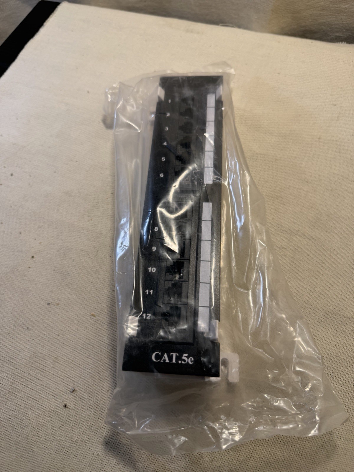 Cat.5e 12-Port Mini Patch Panel 110 IDC 180° Unshielded – New in Bag