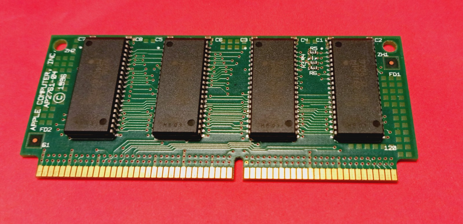 A vintage Apple computer RAM module, specifically a 60-pin SIMM (Single In-line)