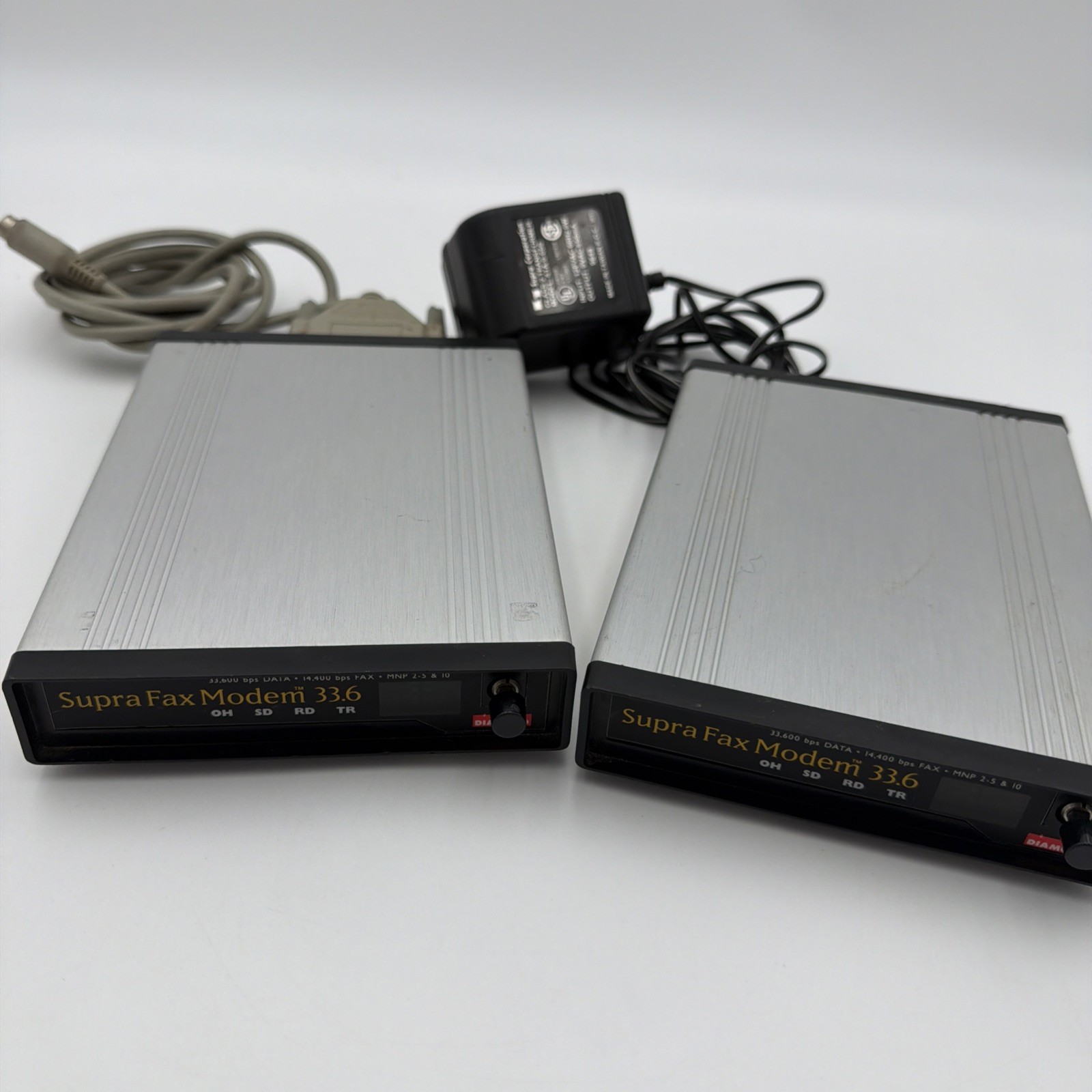 Lot of 2 Supra Fax Modem 33.6 External Modems Mac Serial Cable PSU Tested