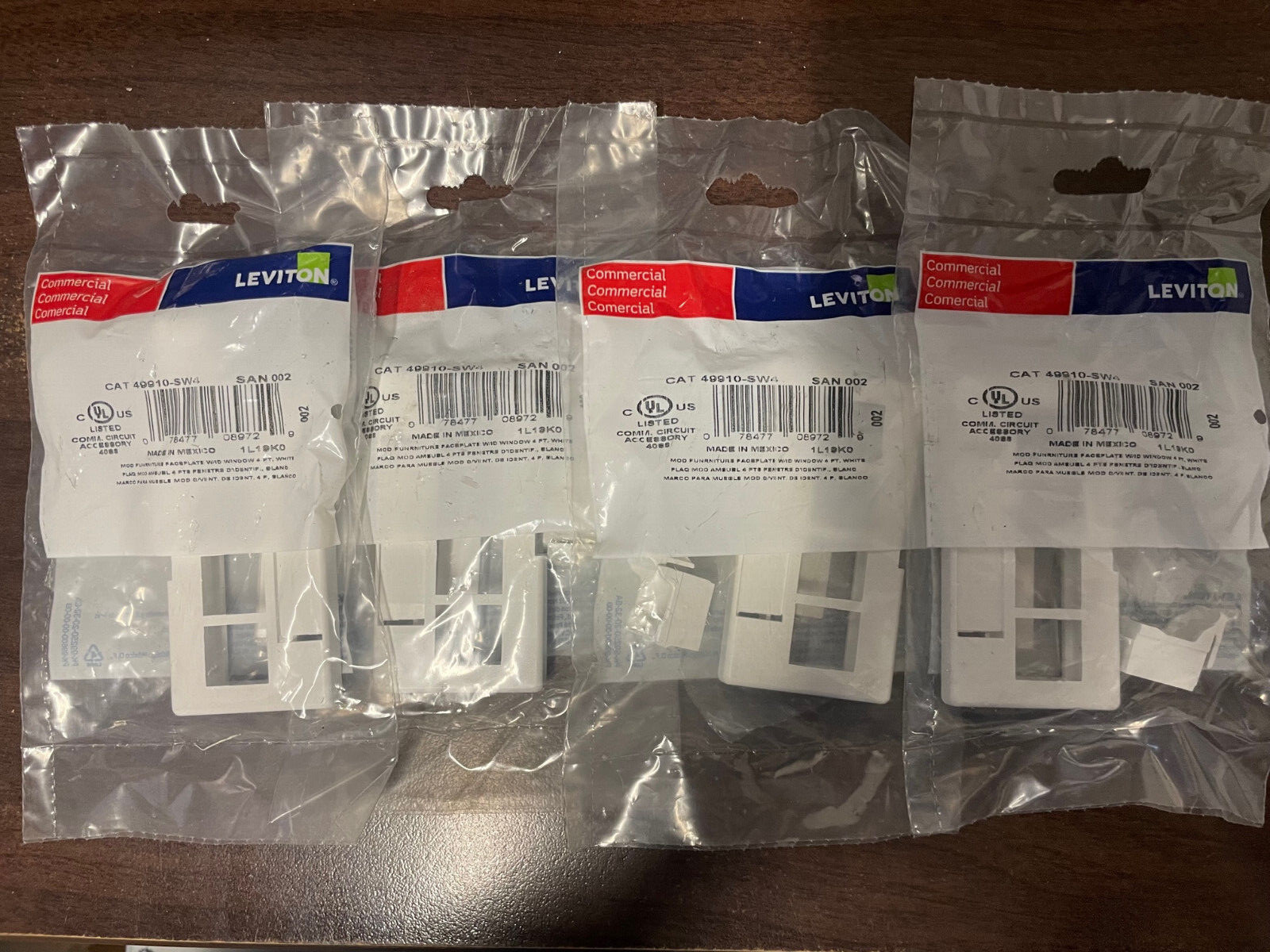 4x Leviton 49910-SW4 4-port modular faceplate w/ ID Window