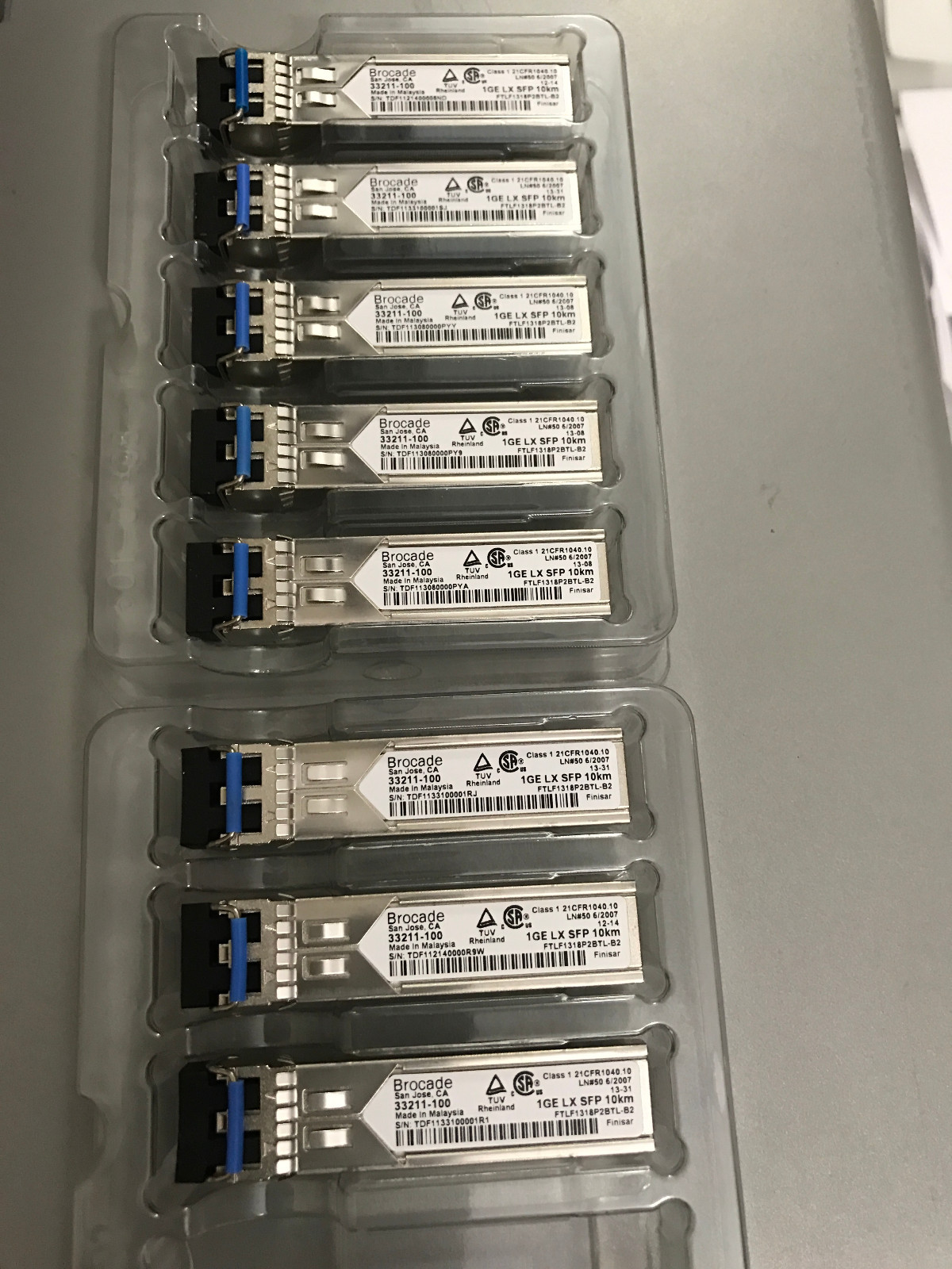 Lot of 8-pack Brocade E1MG-LX-OM-8 33211-100 SFP-LX 1310nm LC SMF
