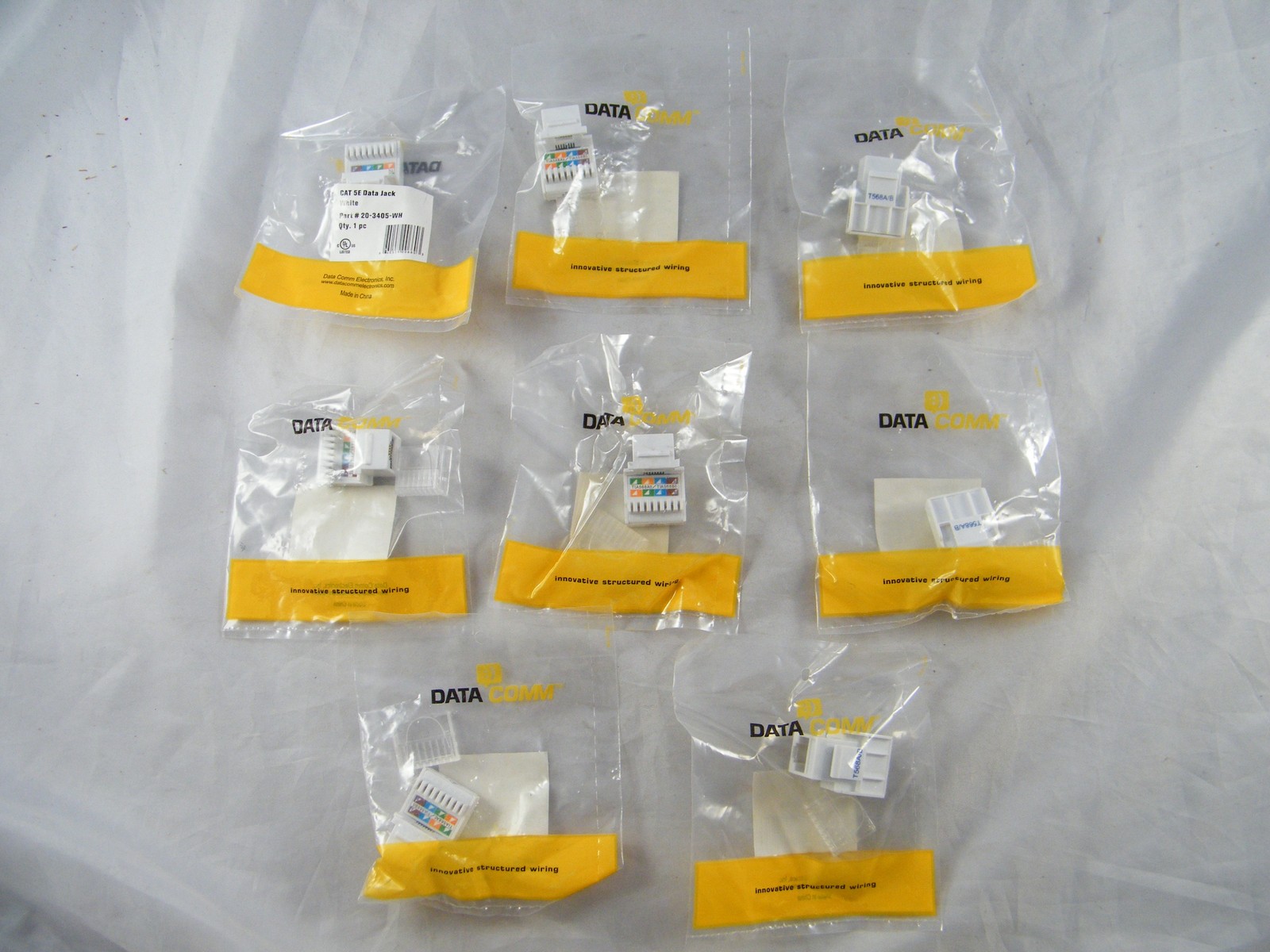 LOT OF 8 NEW ~ DATA COMM ~ CAT 5E  DATA JACK ~ PART # 20-3405-WH ~ WHITE COLOR
