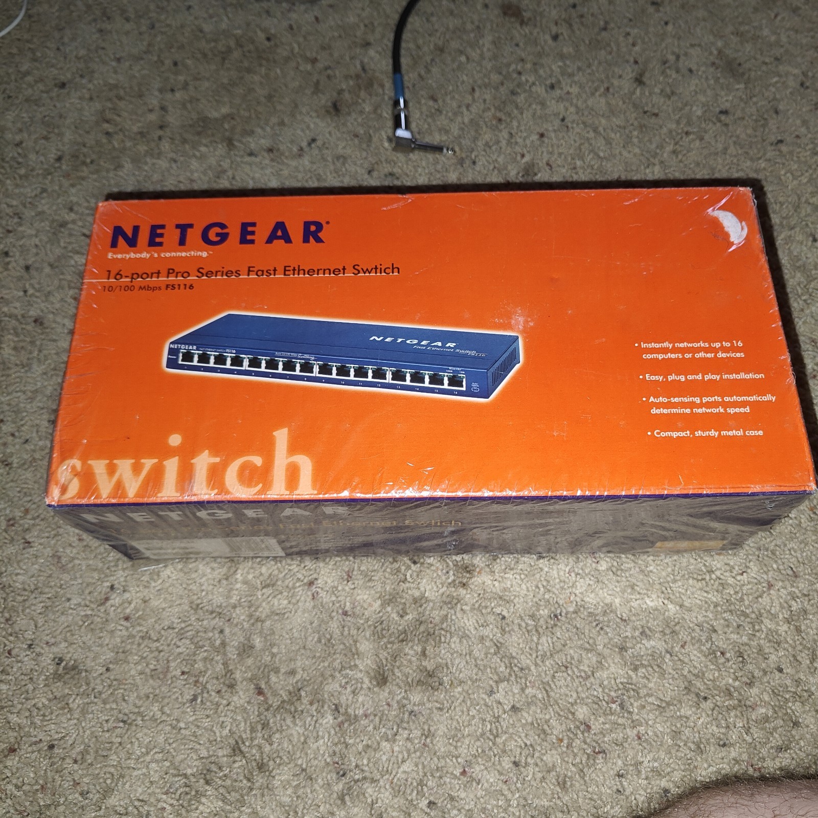 NetGear Model FS 116 ProSafe 16 Port Switch & Adaptor  New box sealed 