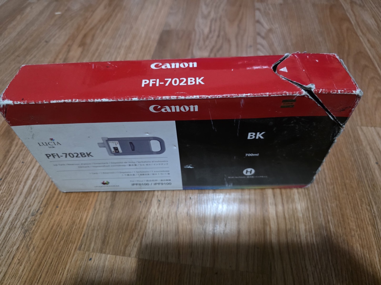 Canon PFI-702BK Black Ink Tank 700ml Genuine - EXPIRED  2011 / Damaged Box