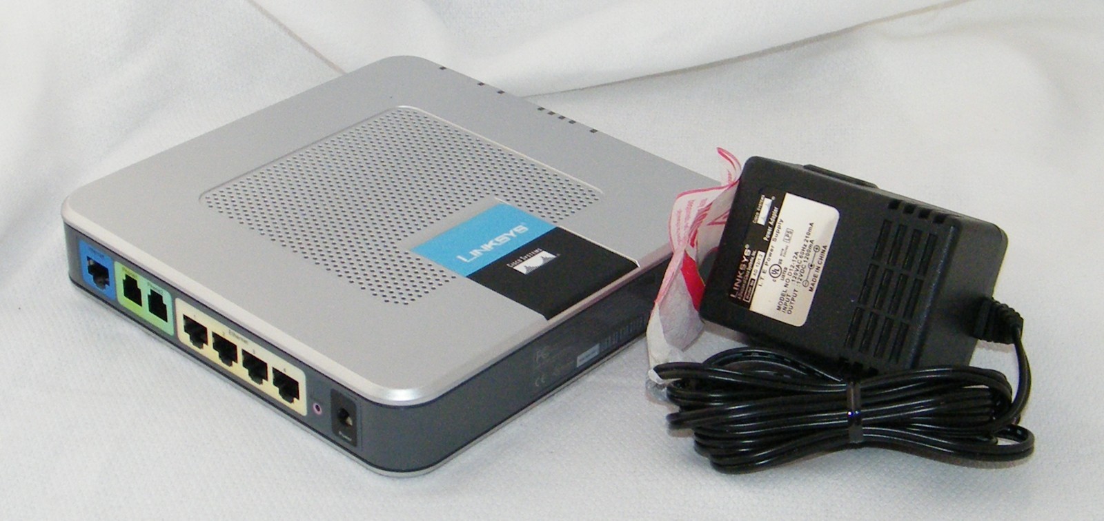 Linksys Broadband Router RTP300 W/ 2 Phone Ports/4 LAN Ports Power Supply Bundle