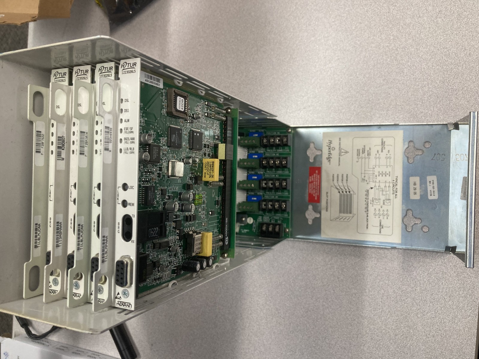 HDSL SmartJack Enclosure with four Adtran H2TUR 1223026L5 HDSL2 cards