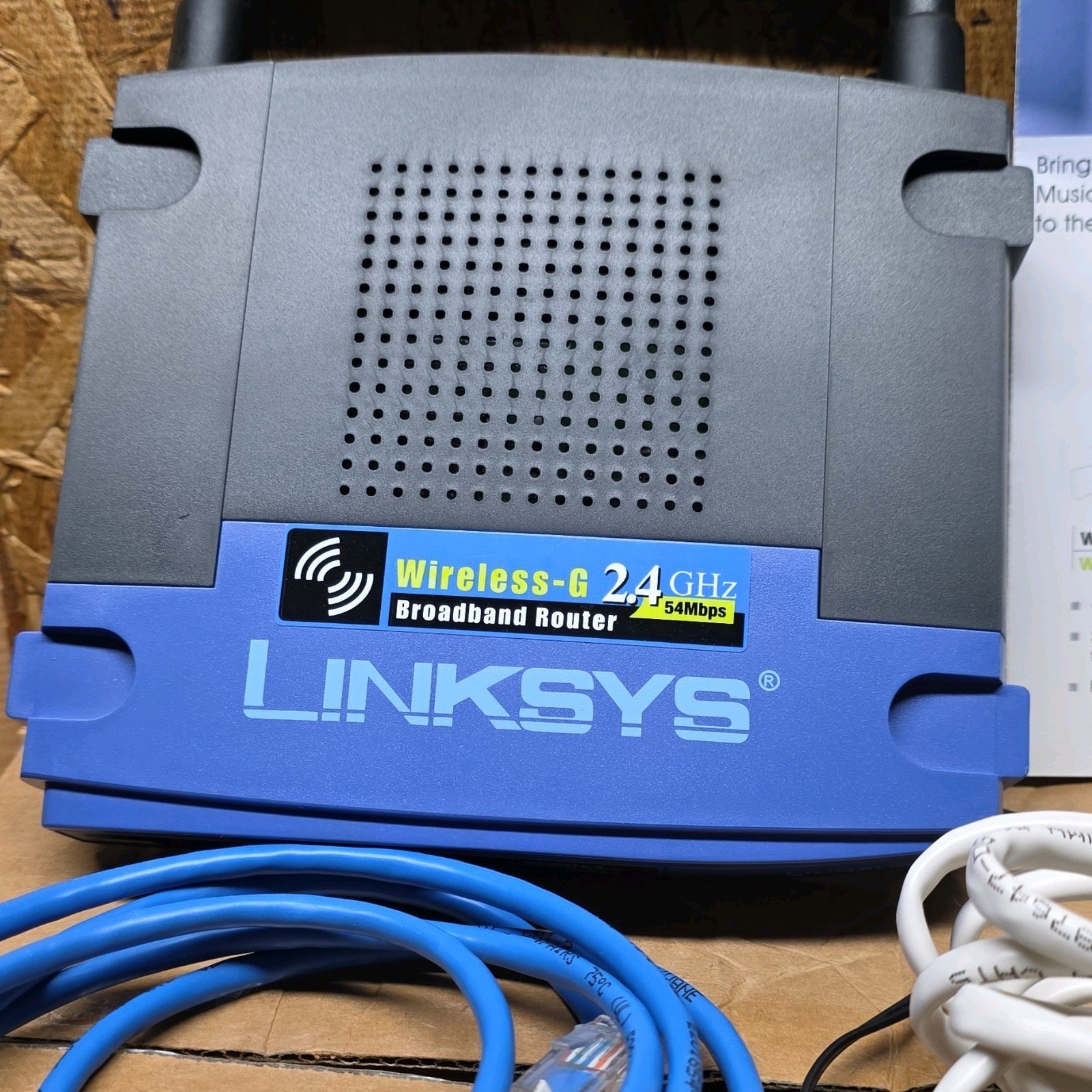 Linksys WRT54GS V7 Wireless Router 54 Mbps 4-Port SpeedBooster Black Blue