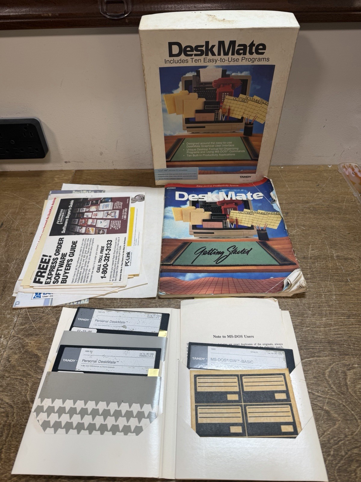VINTAGE TANDY DESKMATE BOX WITH PAPERWORK AND DISKS