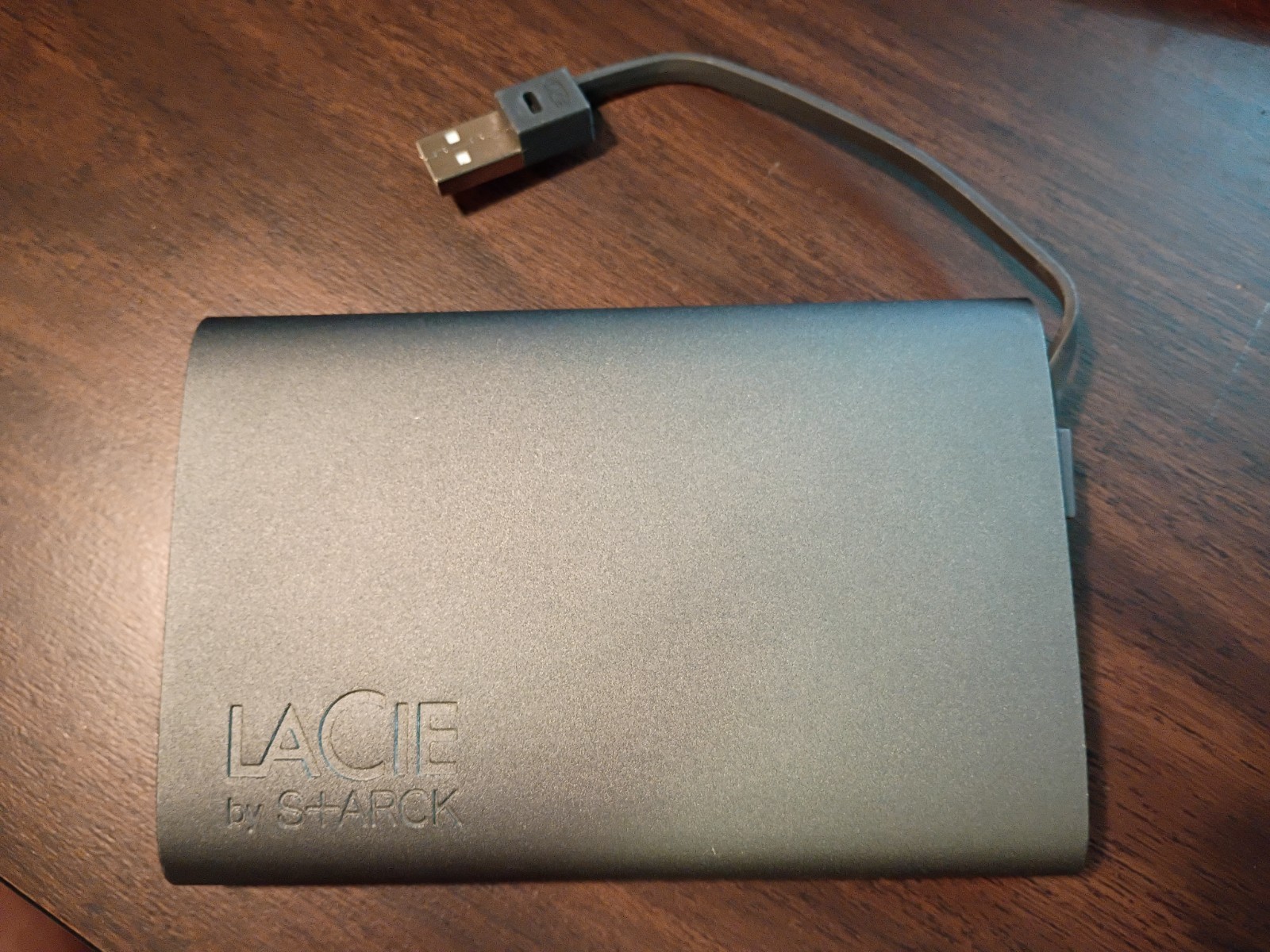 Samsung HM500JI external portable USB drive in LaCie by S+ARCK enclosure, 500GB