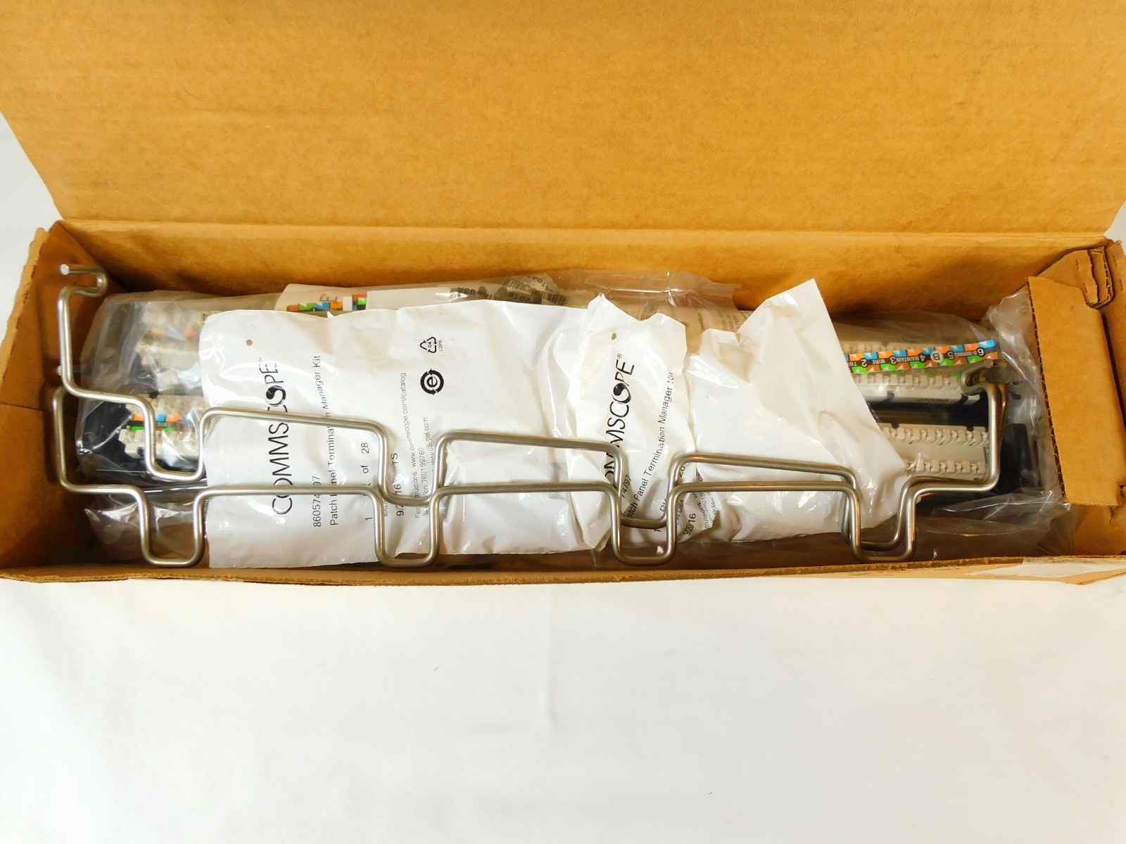 CommScope 760180059 UNP-6-DM-2U-48 Cat 6, 2U, 48 Port Patch Panel, Black