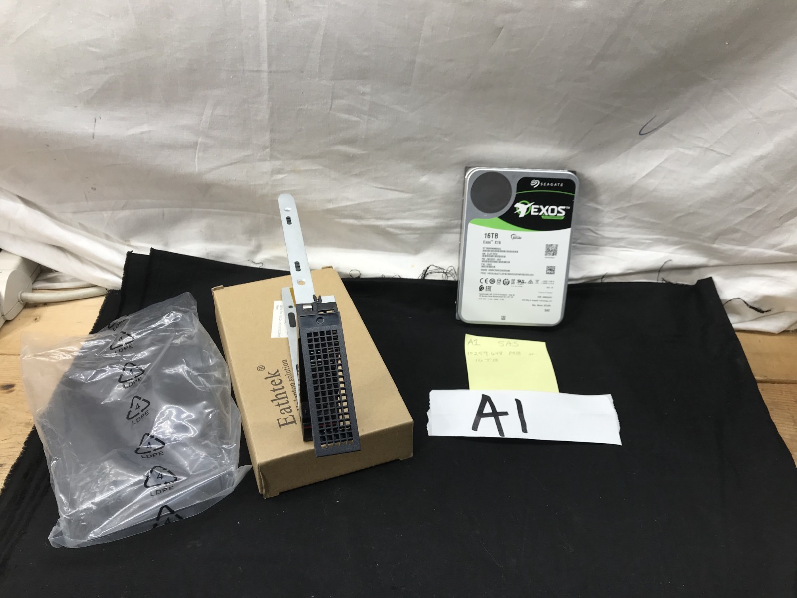 Seagate IBM Exos X16 16TB ST16000NM002G 7.2K RPM STL009 SAS  3.5" HDD W/ Holder