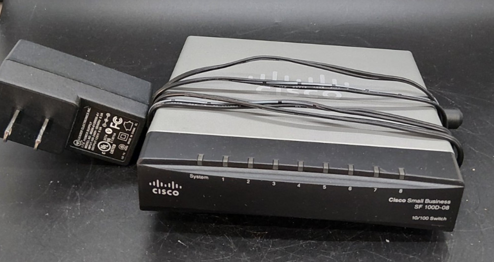 Desk Top Switch Cisco SF100D-08 8-Port 10/100  Business/Home Ethernet W/charger.