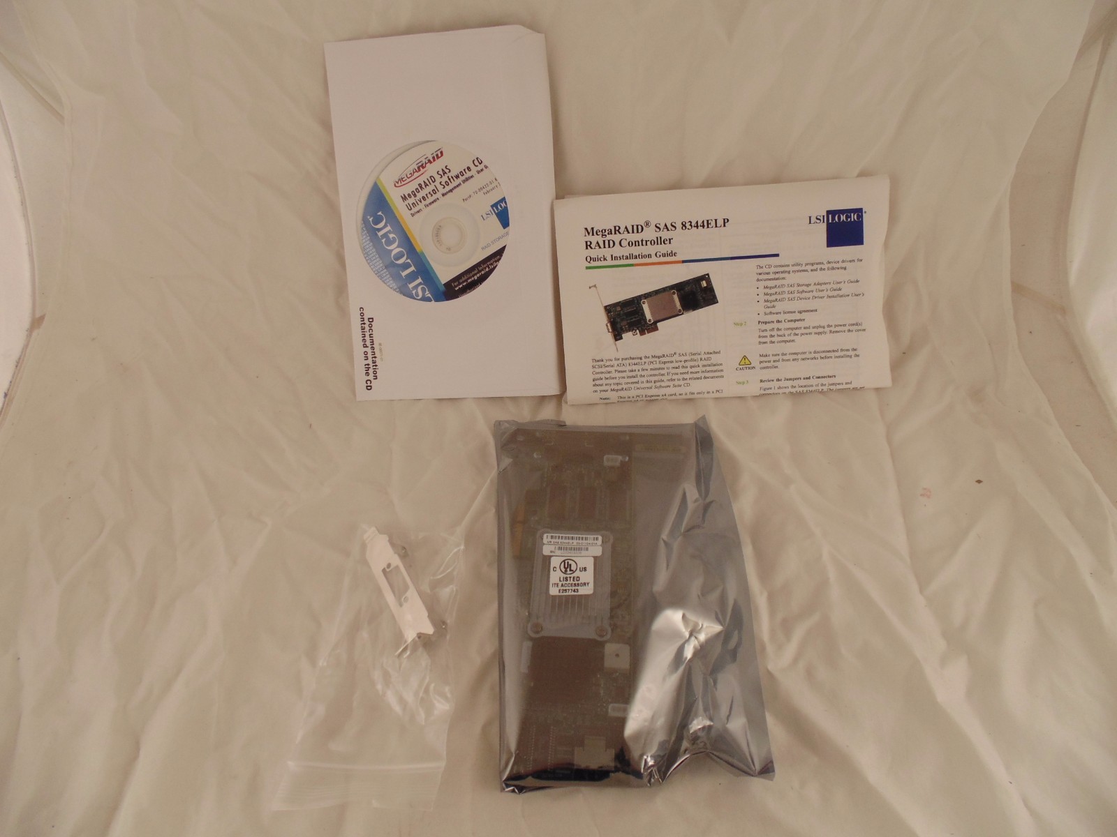 LSI SAS 8344ELP MegaRAID Controller NEW w/Low Profile Bracket & CD OEM 20-2