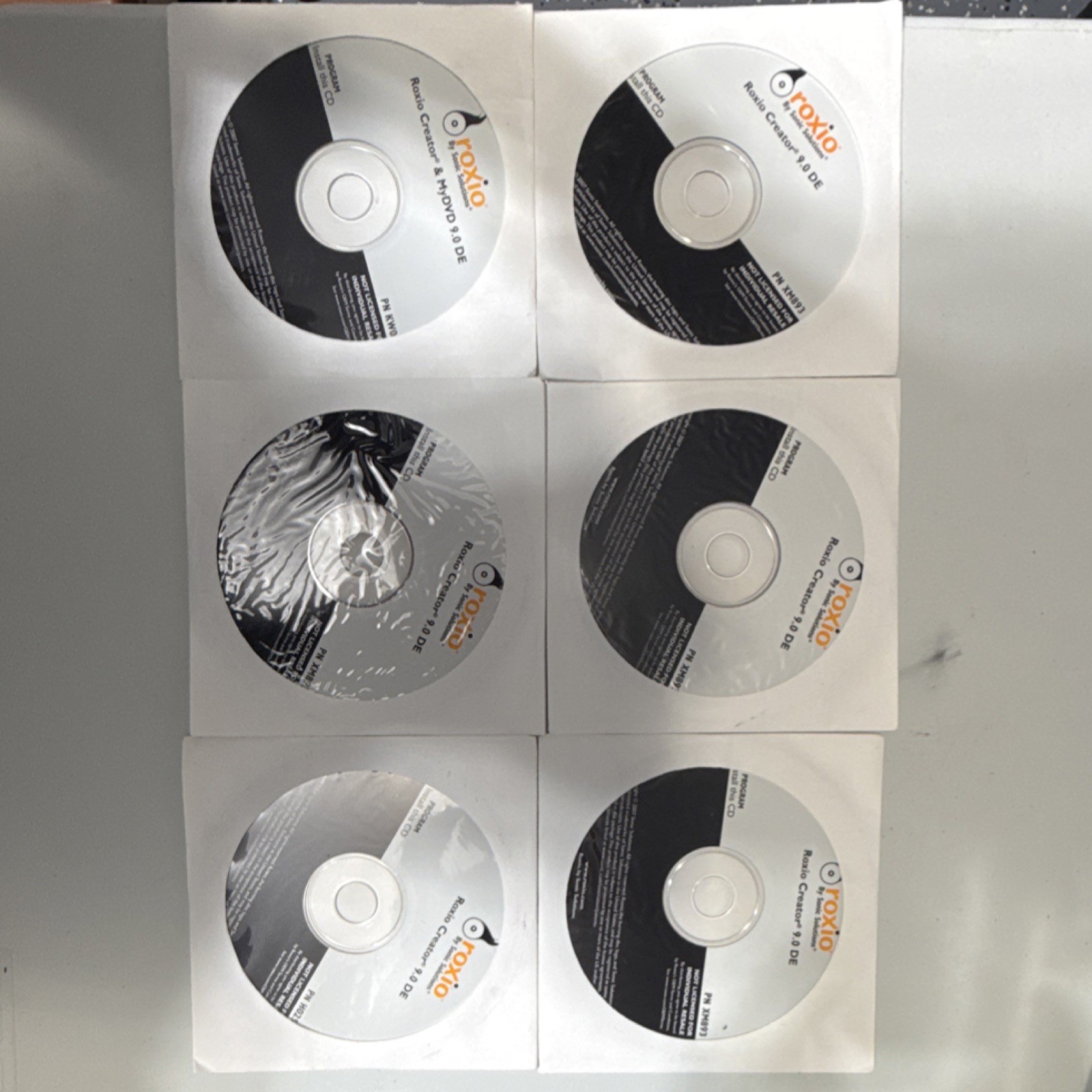 “Lot 6 Roxio Creator 9.0 DE OEM Install Discs PN XM893 - New/Sealed Bulk”