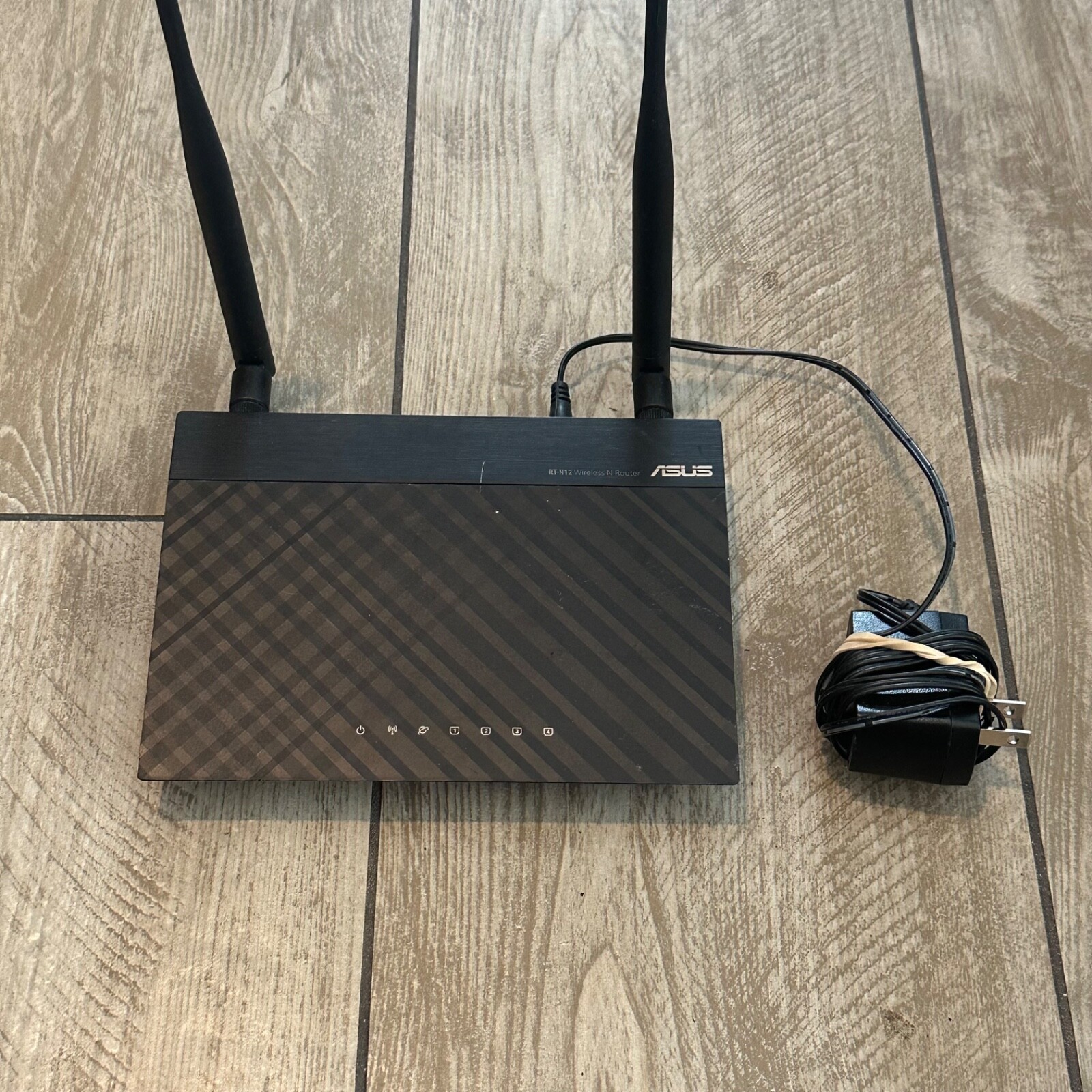 ASUS RT-N12 300 Mbps 4-Port 10/100 Wireless N Router (RT-N12 B1)