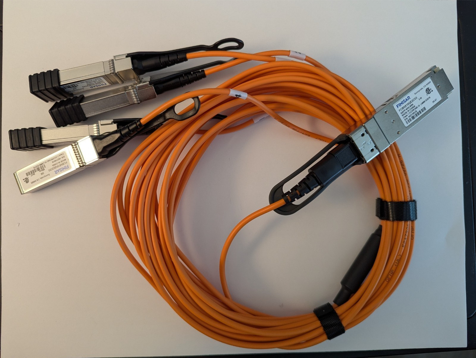 FINISAR FCBN510QE2C03 CABLE 4SFP+-QSFP+ 3M