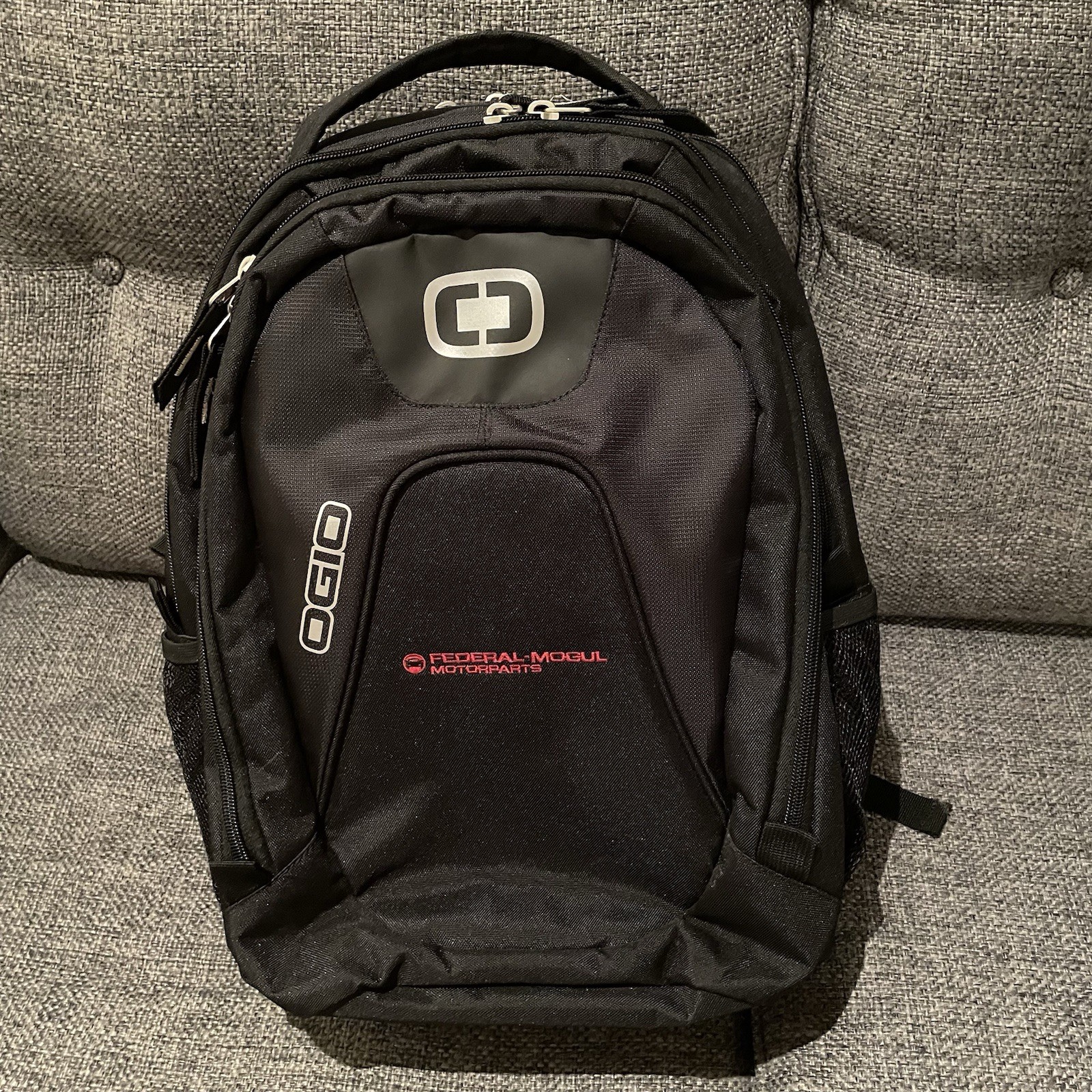 Black OGIO Juggernaut Pack laptop backpack , Federal mogul Embroidered