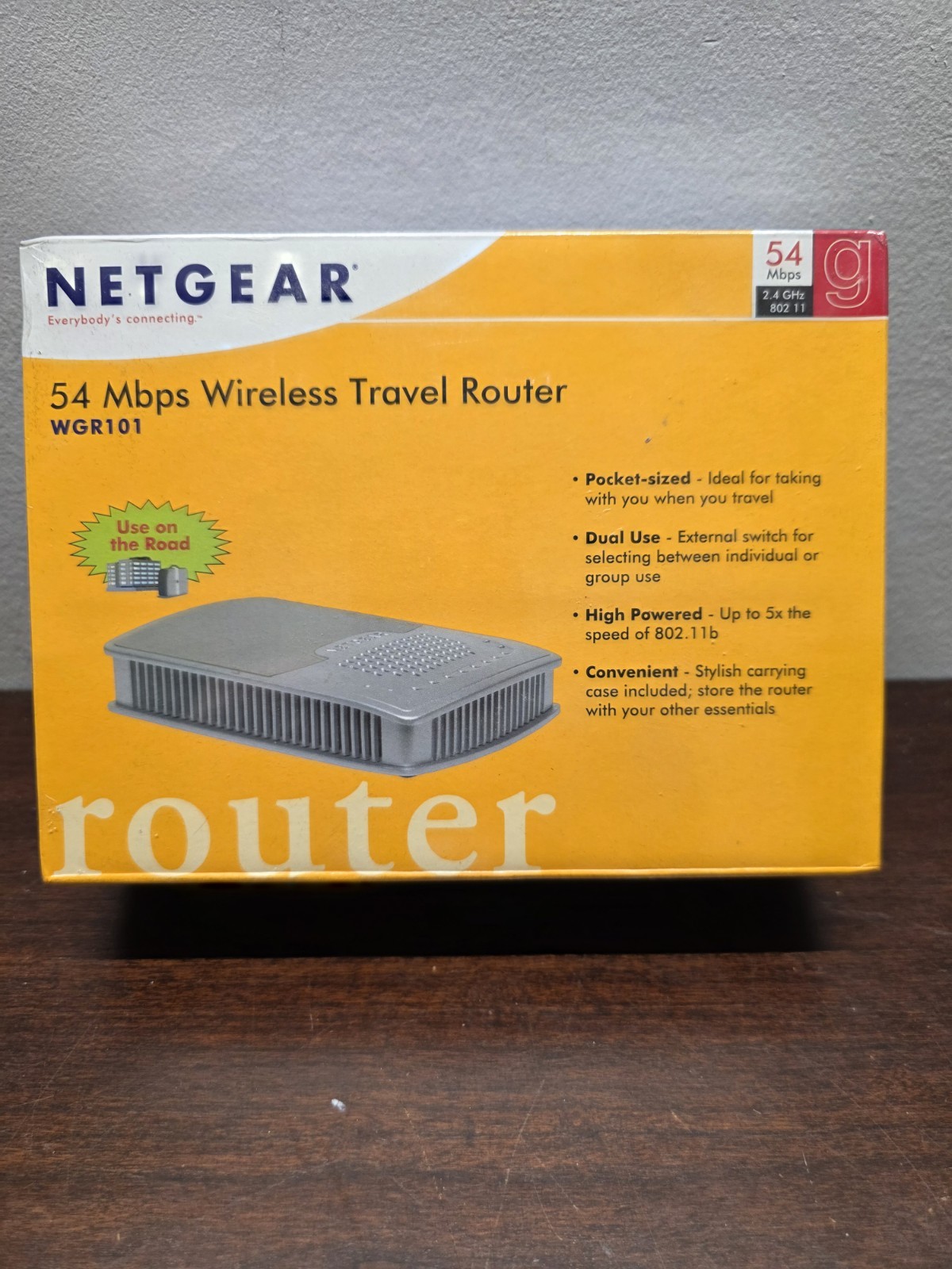 Netgear WGR101, a pocket-sized 54 Mbps wireless travel router NIB Factory Sealed