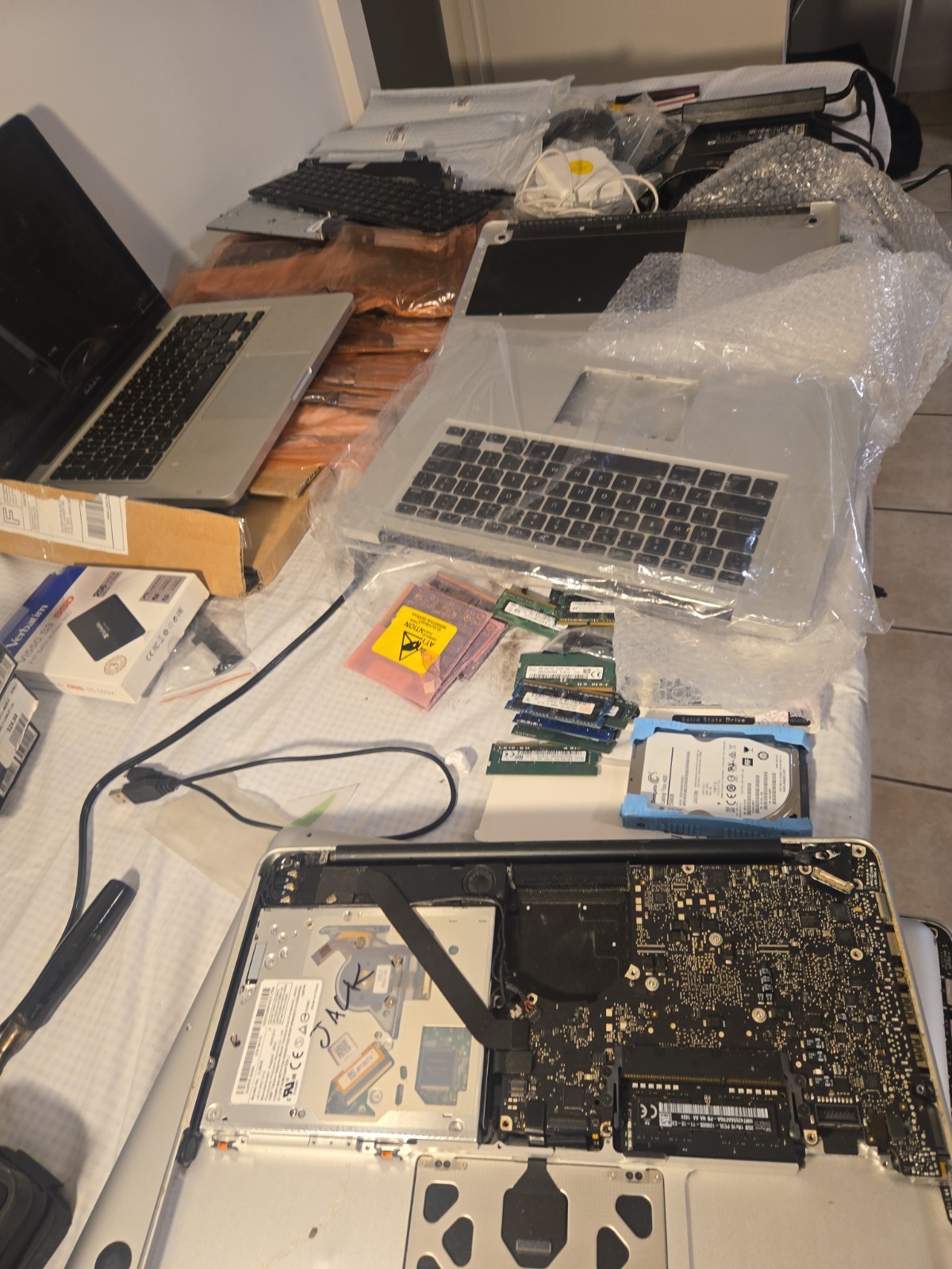 Laptop Repair Shop Parts Lot MacBook SSD RAM Chargers Cables Keyboards Untested