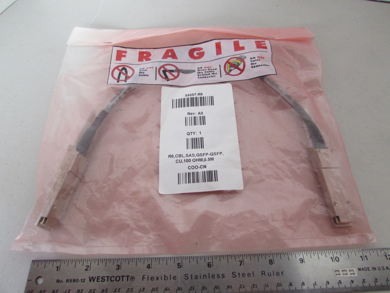 New NETAPP X6557-R6 Rev. A0 R6 CBL SAS QSFP-QSFP CU 100 OHM, .5M COO-CN