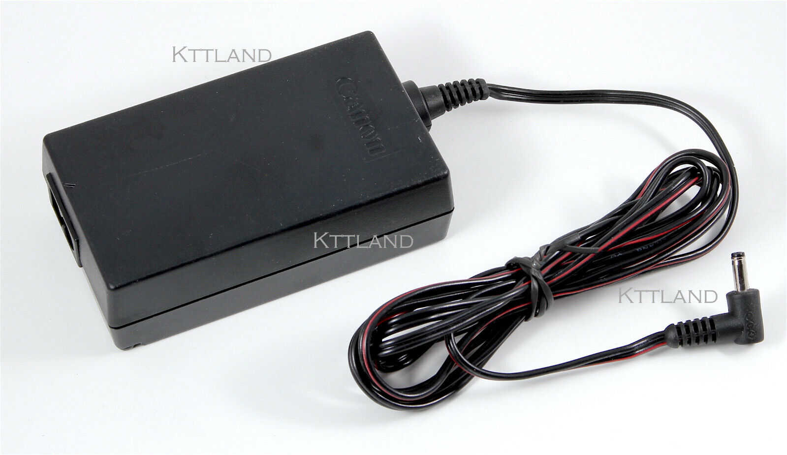 Genuine Canon CA-570 AC Adapter power supply 8.4V @1.5A M306 M307 HF S200 300D