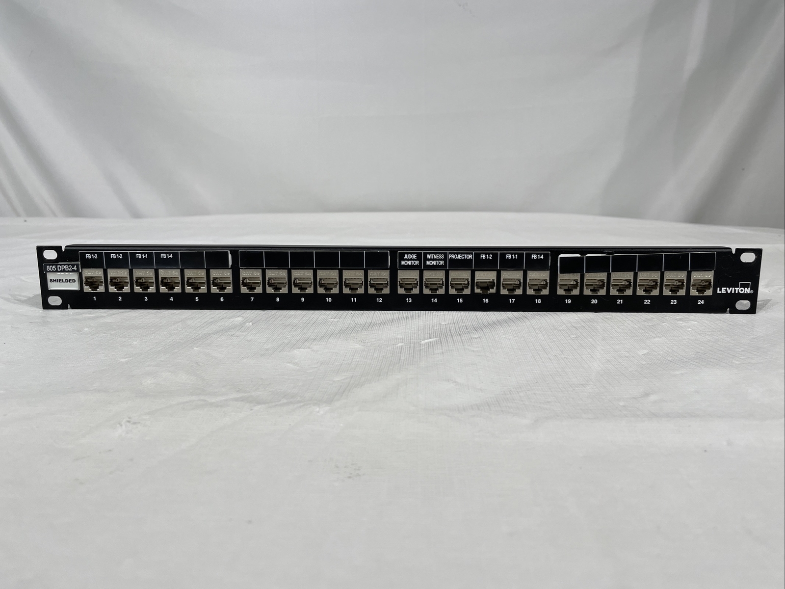 Leviton Cat 5e Flat Universal Patch Panel 24-Port, Cable Management Bar
