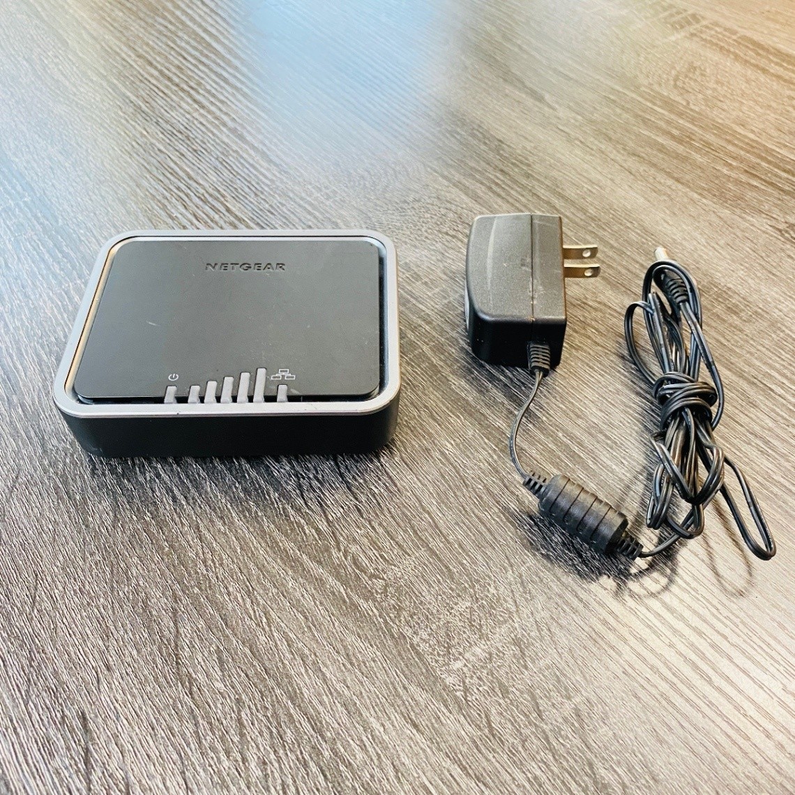 NETGEAR LB1120 4G LTE Unlocked Modem 150 Mbps 1x RJ-45 SIM Slot w/ power adapter