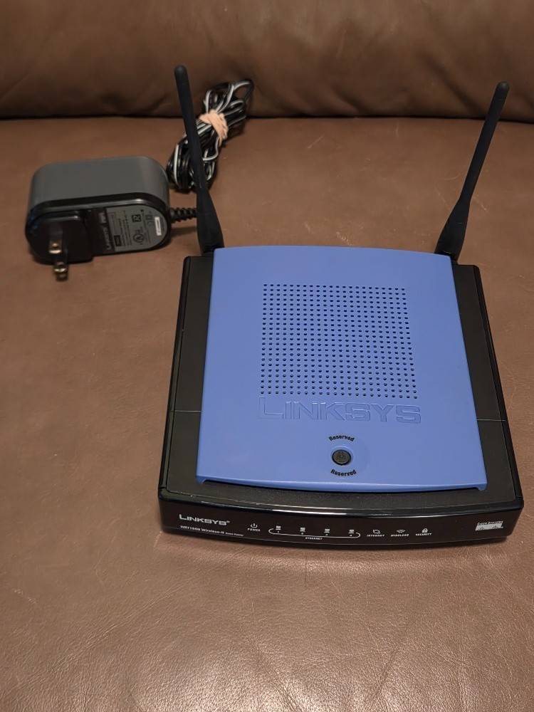 WRT150N LINKSYS Wireless-N Home Router w/ Power Cable, Manual & CD