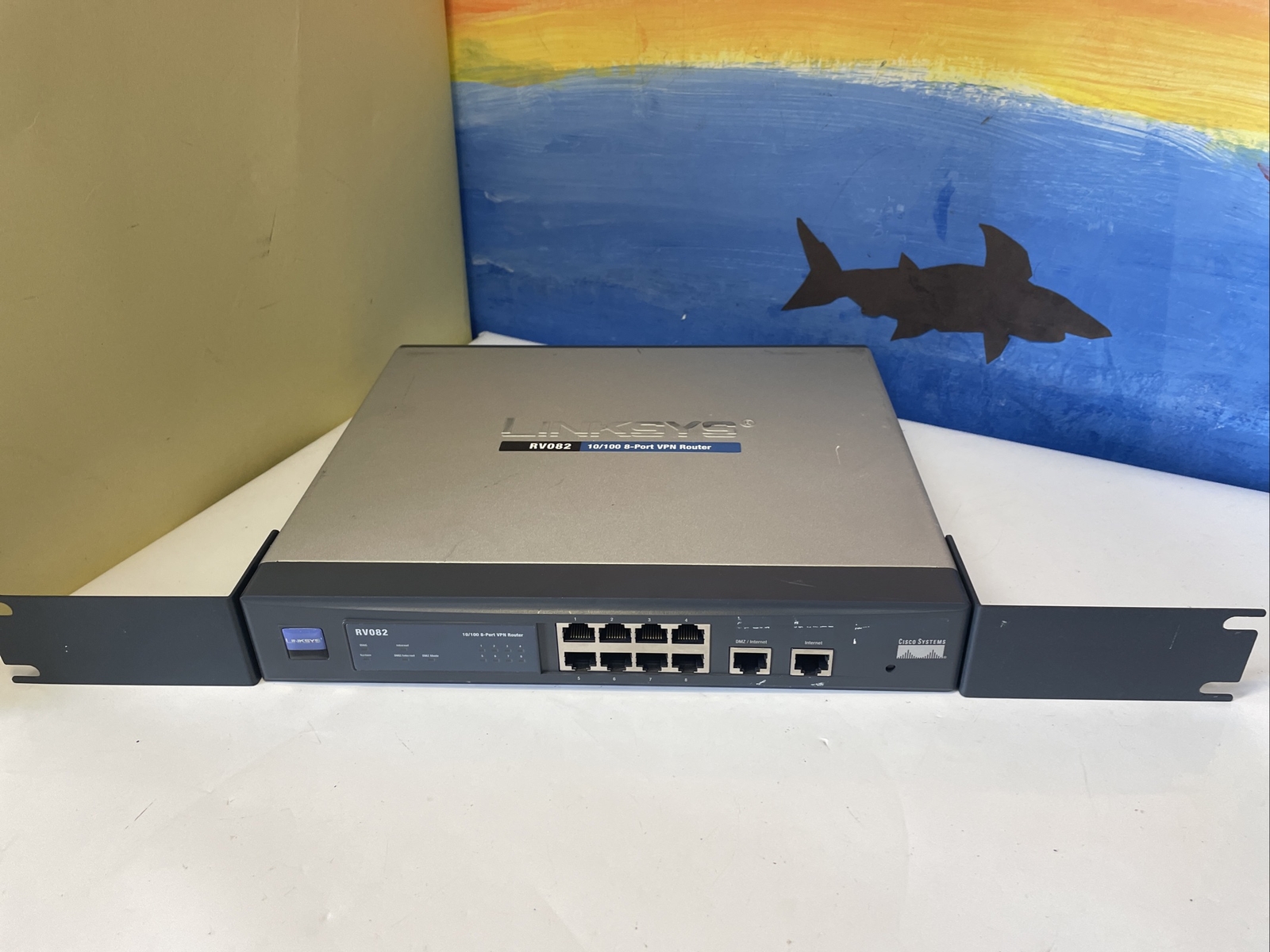 1x   Cisco System Linksys RV082 10/100 8-Port VPN Router with ears