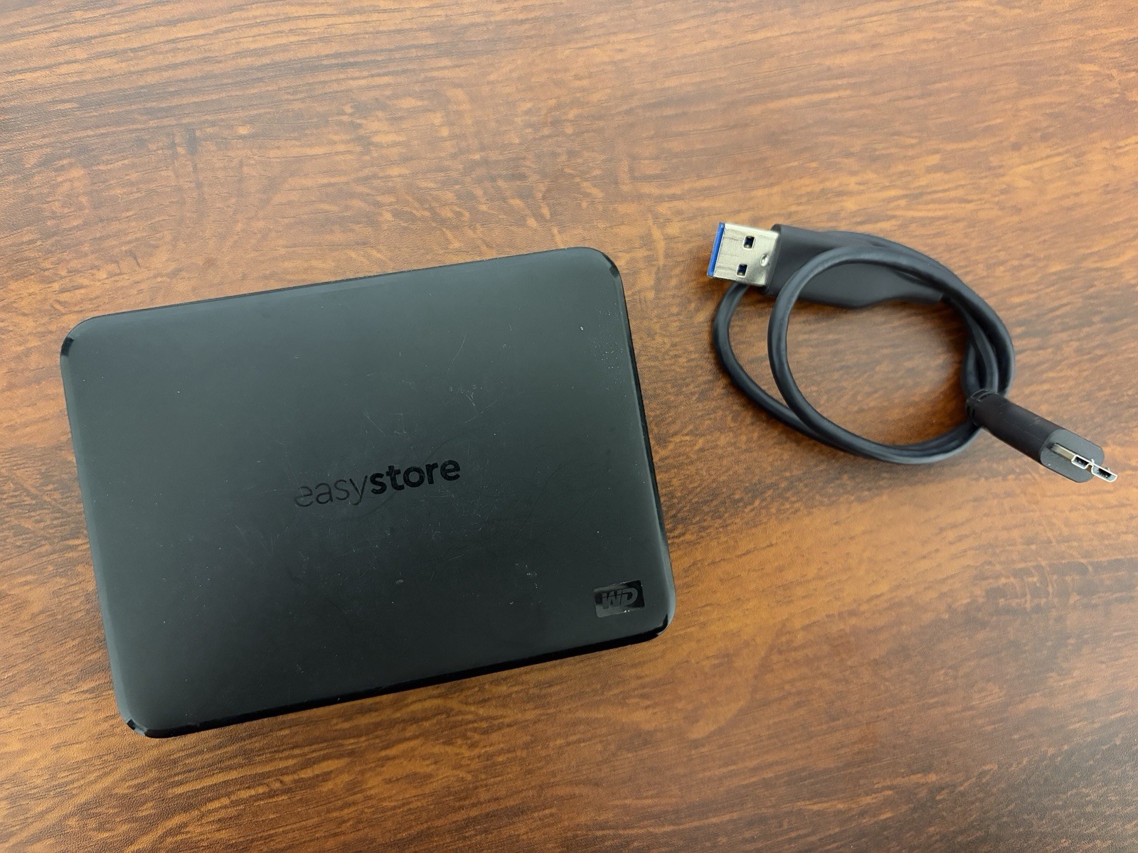 Western Digital EasyStore 4 TB External Hard Drive - WDBAJP0040BBK (9k hours)