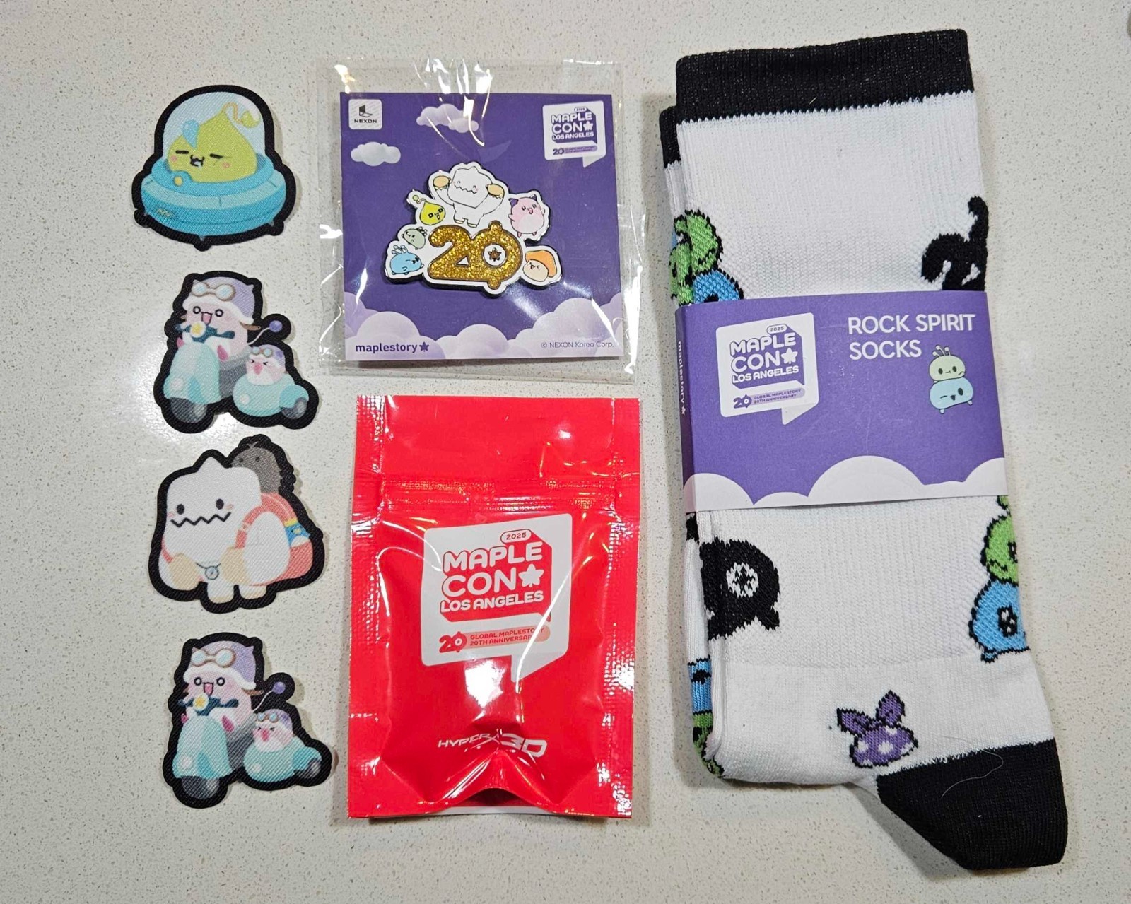 Maplestory MAPLECON 2025 Bundle - Rock Spirit Socks, Zakum Keycap, Pin, Patches