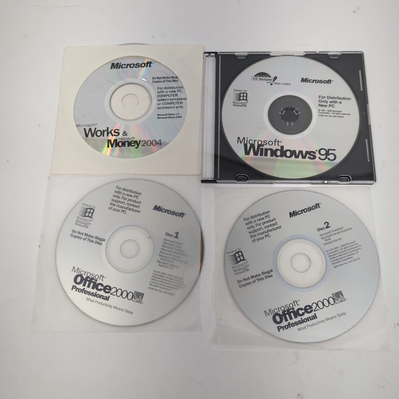 Microsoft Software Lot: Windows 95, Office 2000 Pro, Works 7.0, Money 2004 CDs