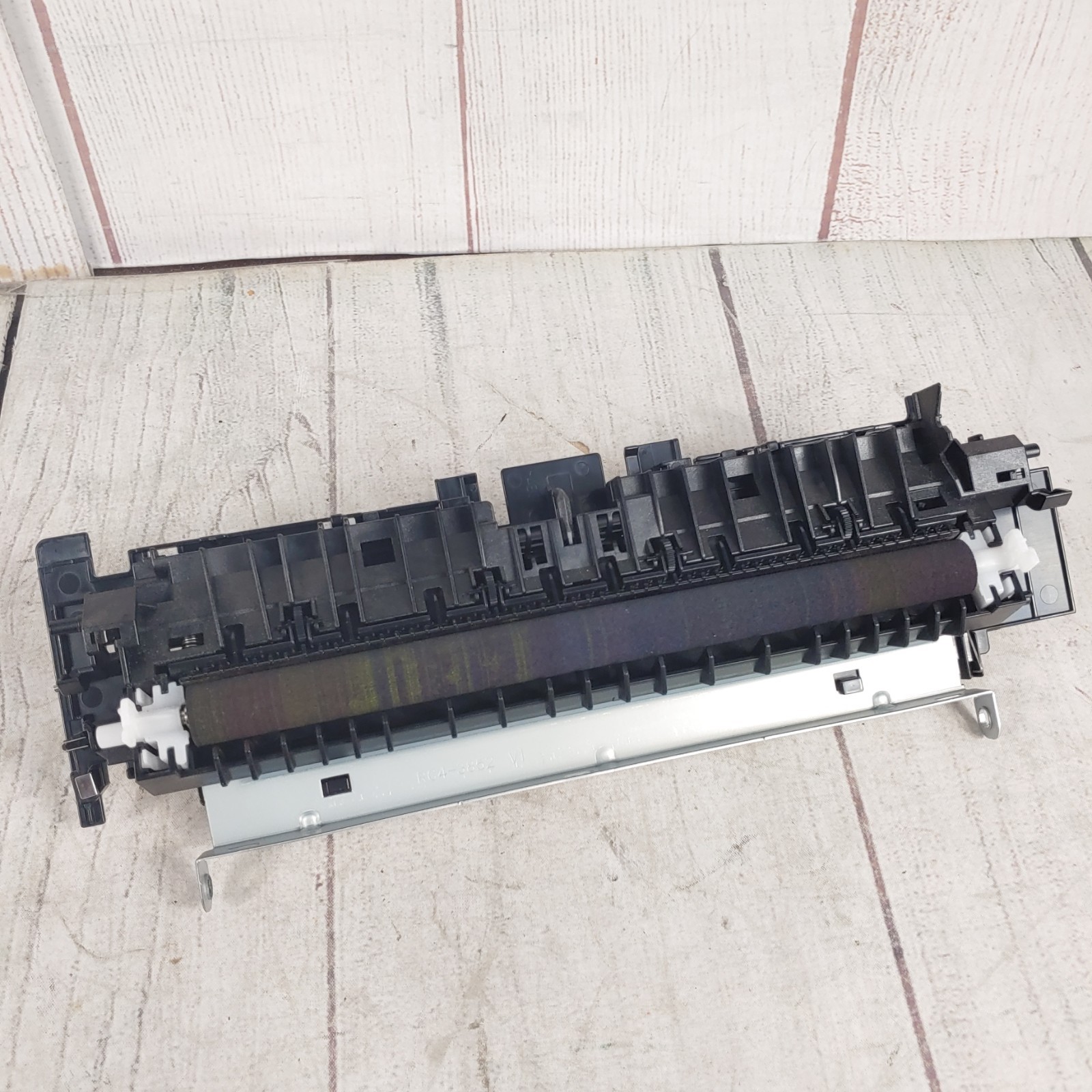BEHIND BACK DOOR WIDE PAPER ROLLER - HP Color LaserJet Pro MFP M283CDW Printer