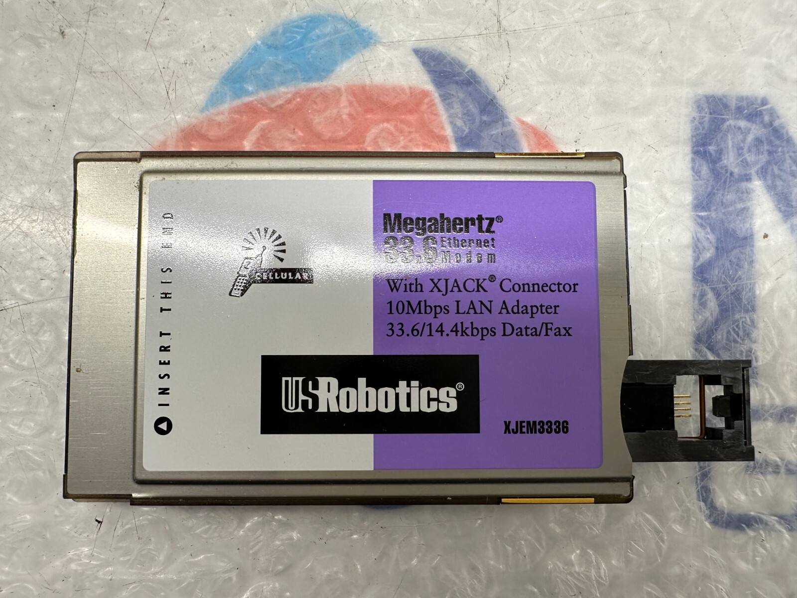US Robotics 33.6K Megahertz PCMCIA Modem/Ethernet (XJEM3336) with LAN Adapter