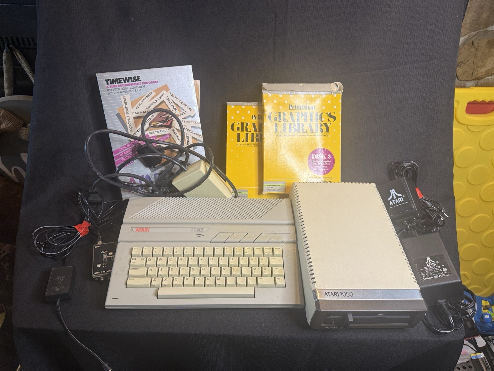 Atari 130 XE/Atari 1050 Bundle W/ Cords And Extras (Powered On)