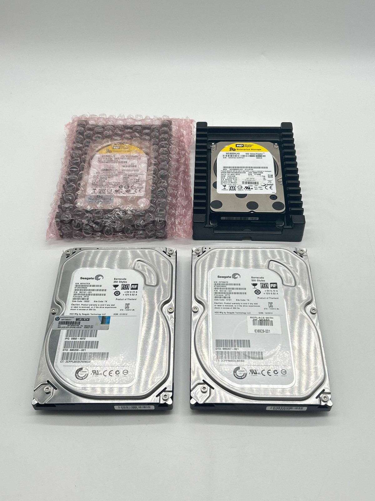 Seagate and Western Digital Hard Drive Lot 4 Pieces Including WD 300GB Sealed- L