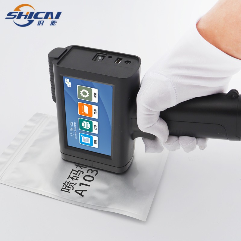 Handheld Inkjet Printer Prints Batch Number and Production Code on Egg Boxes